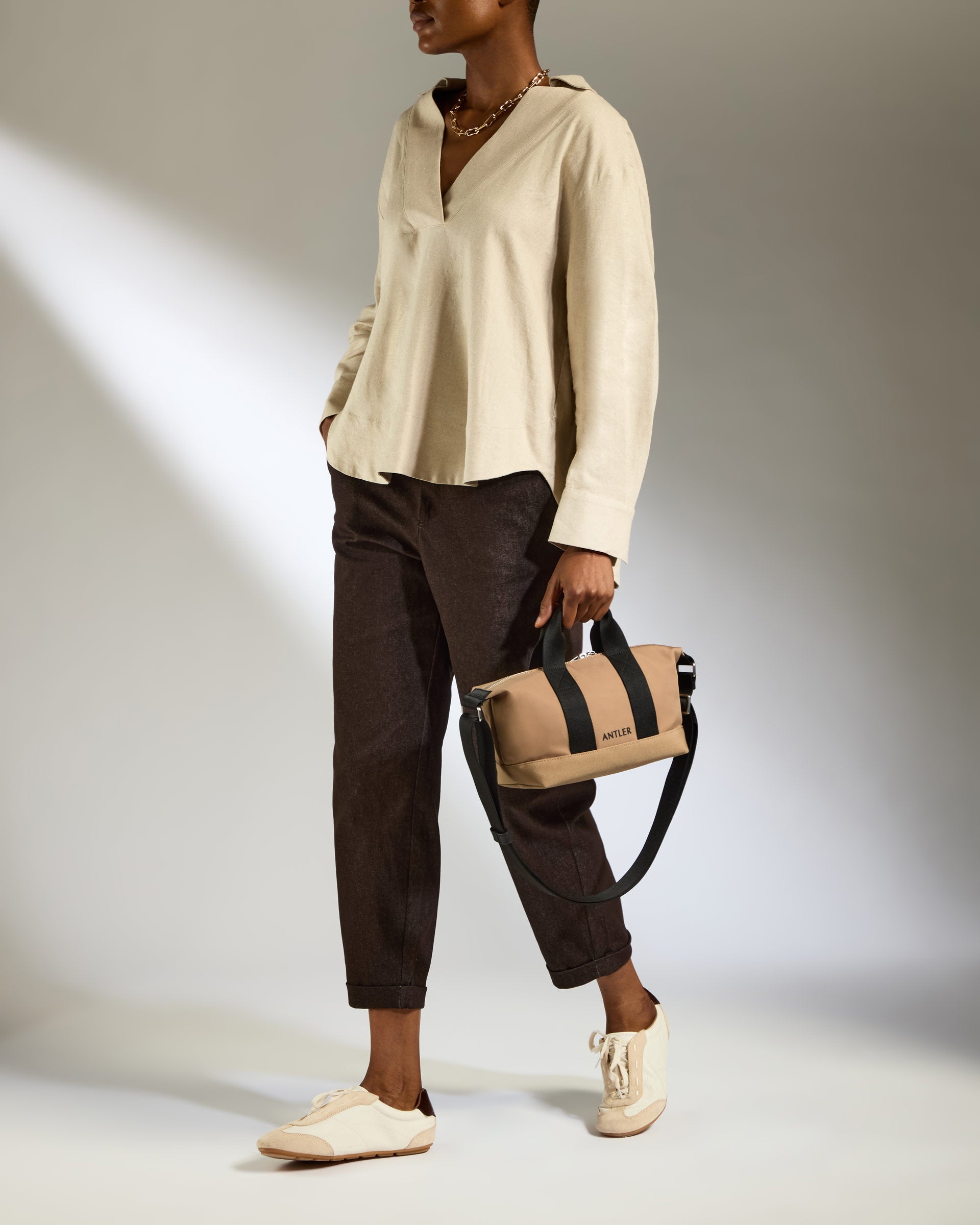a woman holding a bag