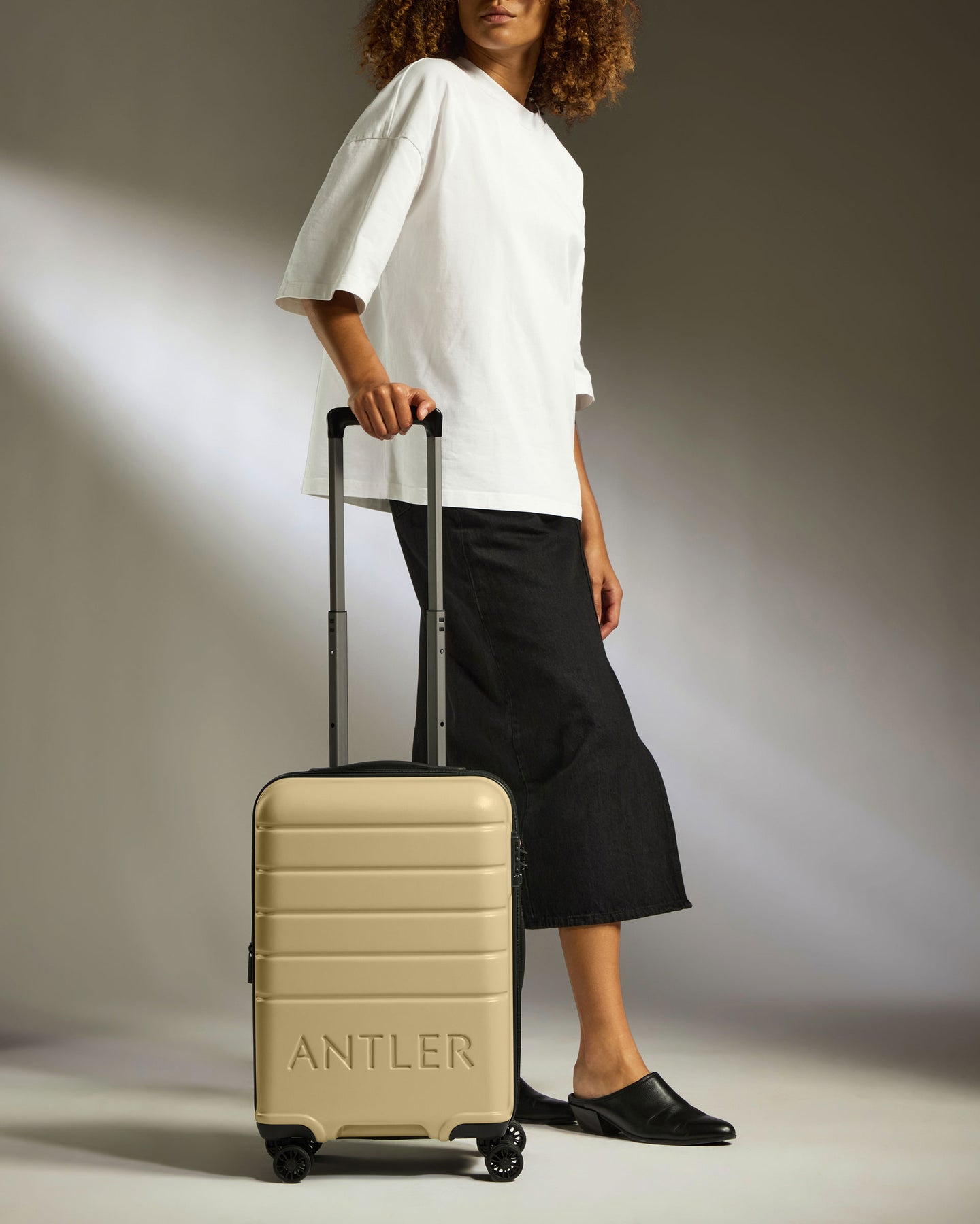 Expandable Carry-On Luggage in Dark Sand - Logo