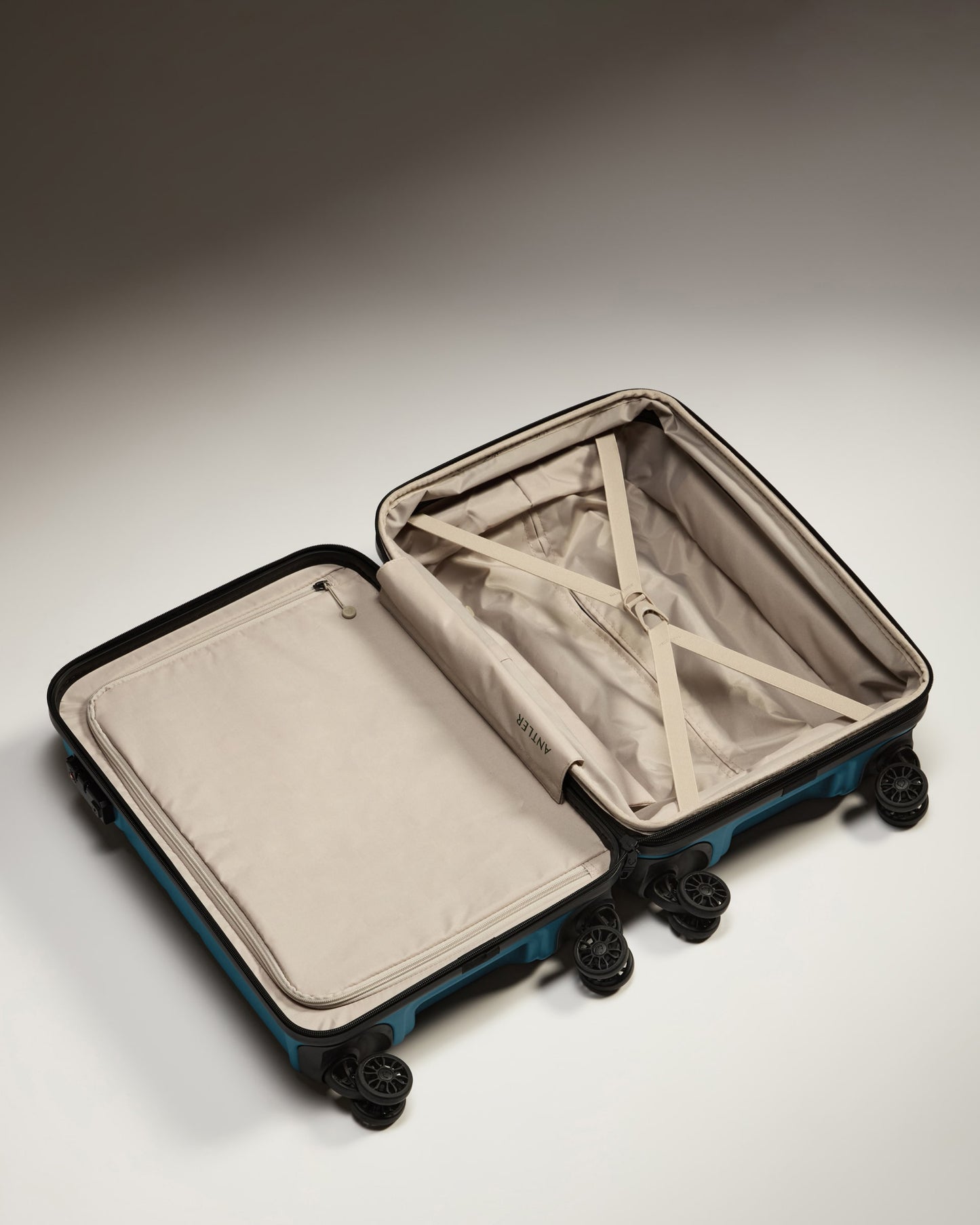 a suitcase with wheels and a lid