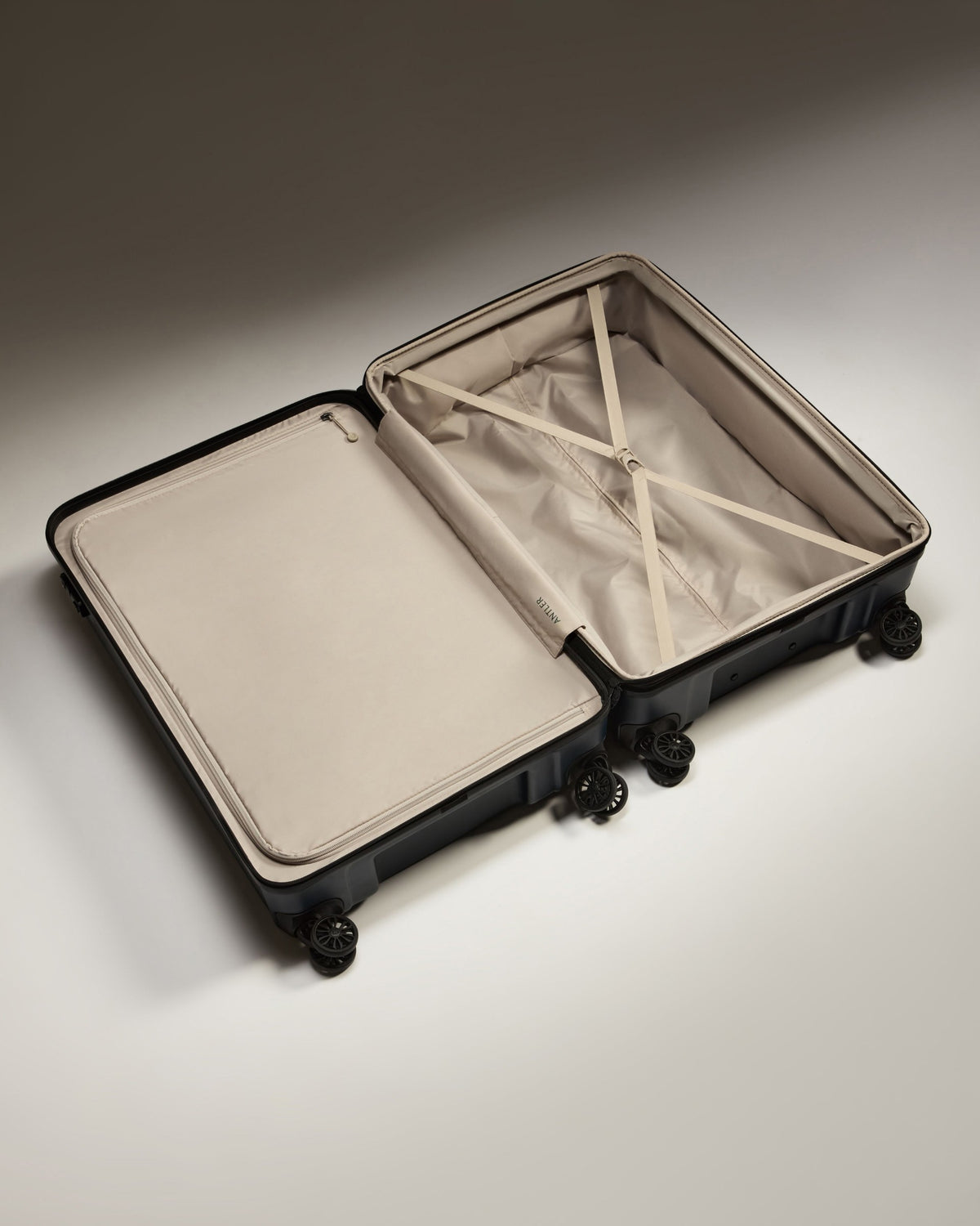 a suitcase with wheels and a lid
