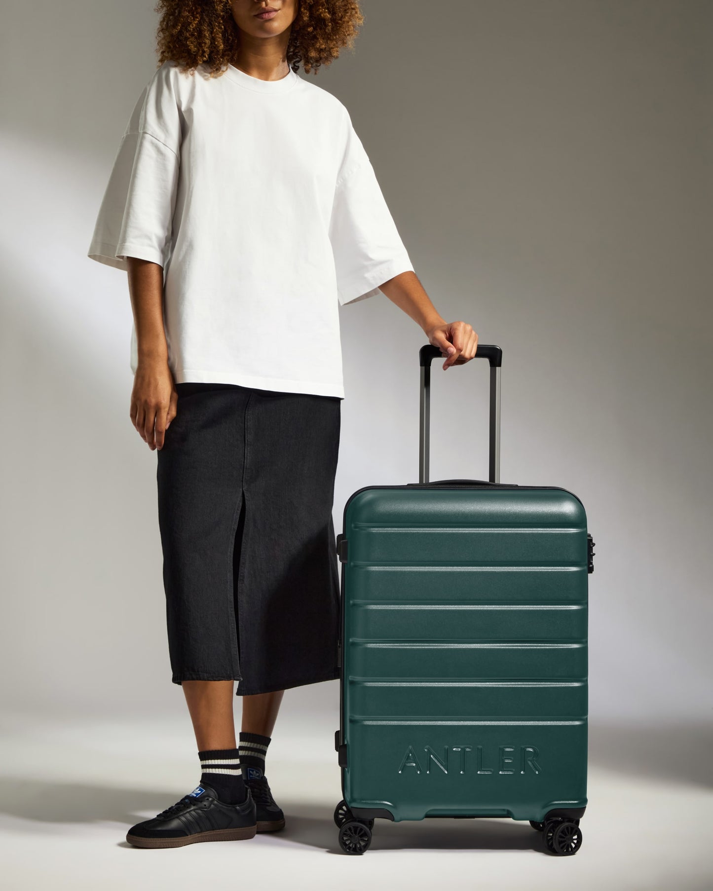 Medium Luggage in Dark Teal - Logo