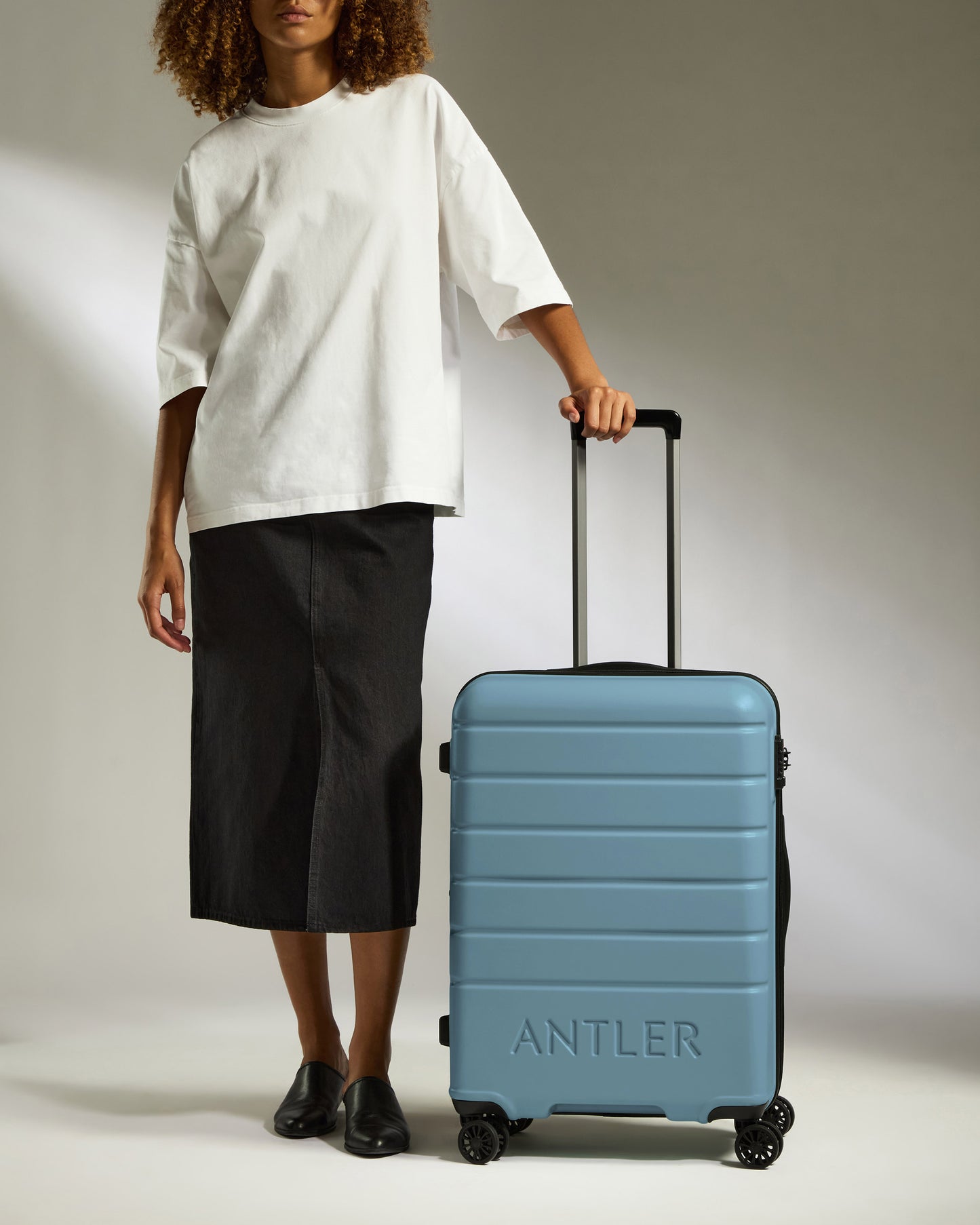 Medium Luggage in Light Blue - Logo