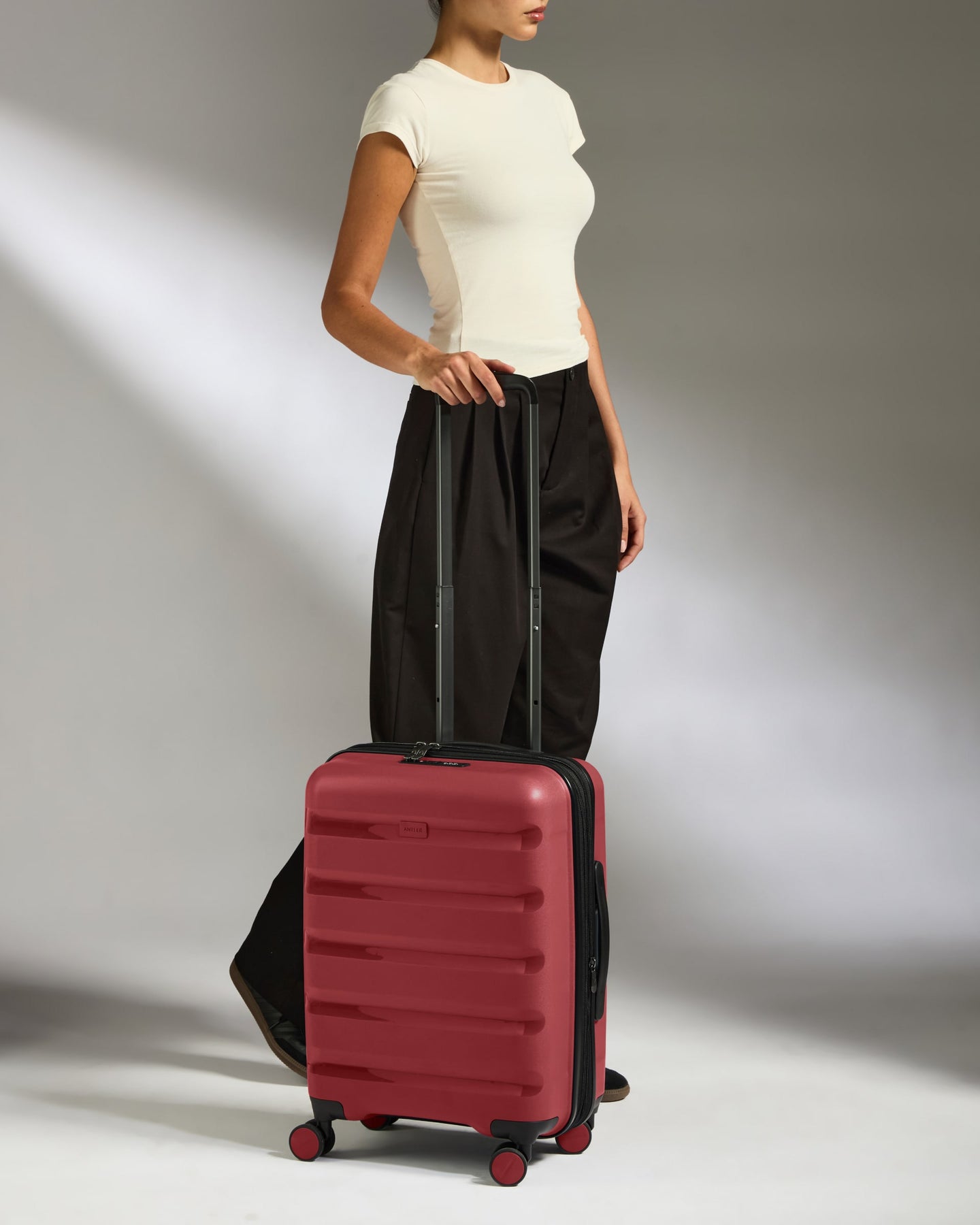 Expandable Carry-on Luggage in Soft Red - Logo Stripe