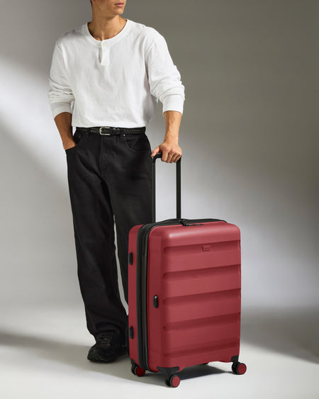Medium Luggage in Soft Red - Logo Stripe