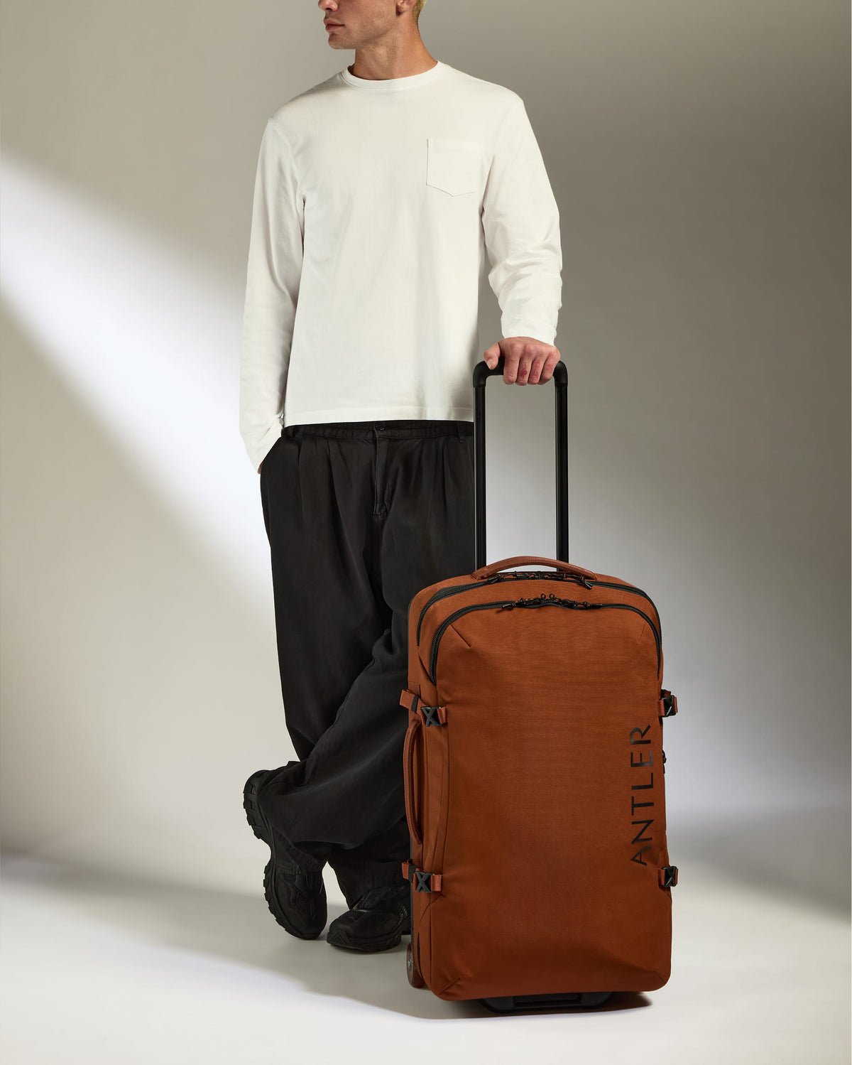 a man with a suitcase