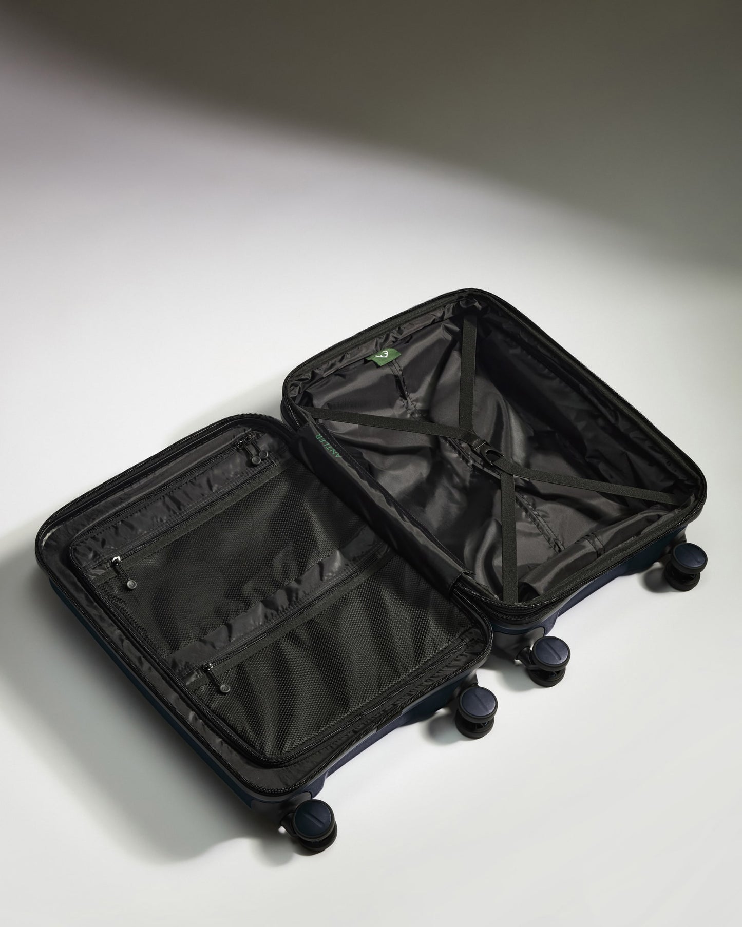 Expandable Carry-on Luggage in Navy - Logo Stripe