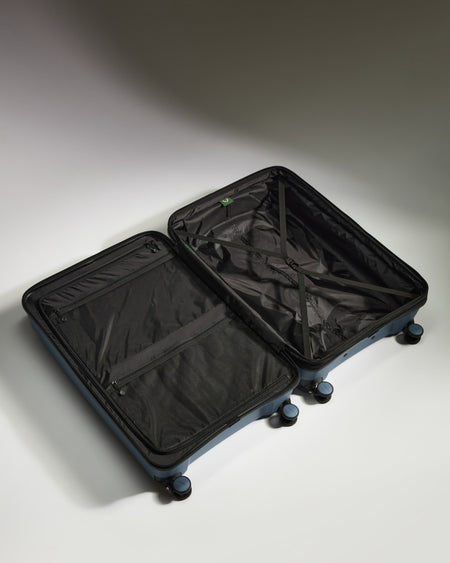 Large Luggage in Light Blue - Logo Stripe