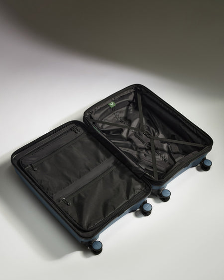 Medium Luggage in Light Blue - Logo Stripe