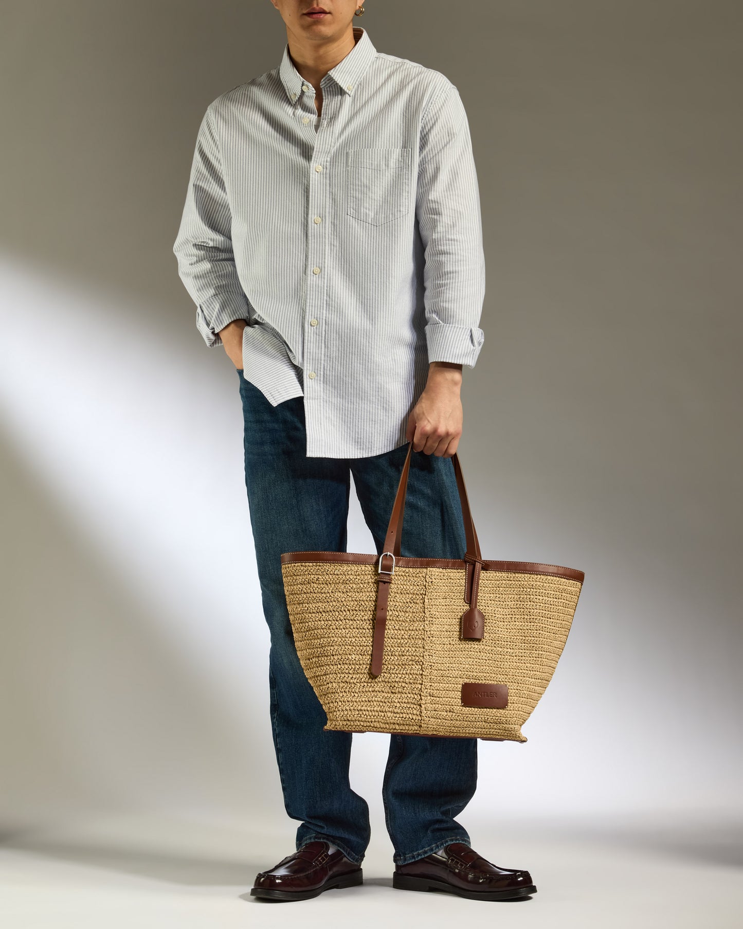 a man holding a bag