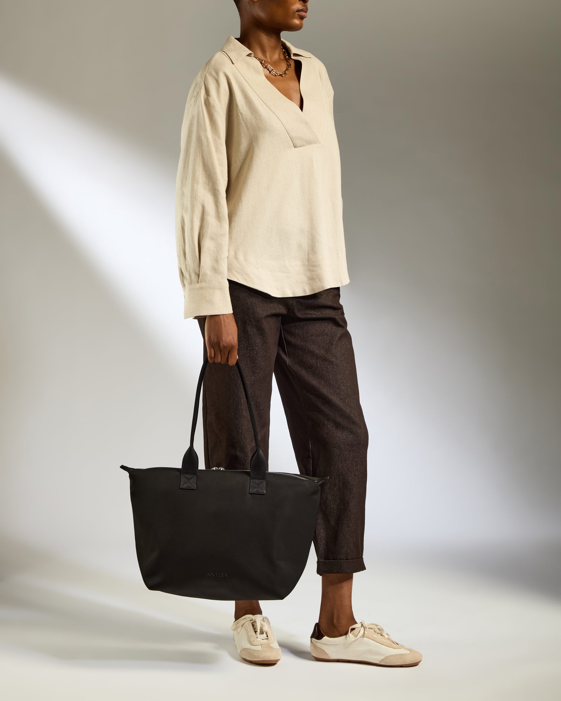 a woman holding a bag