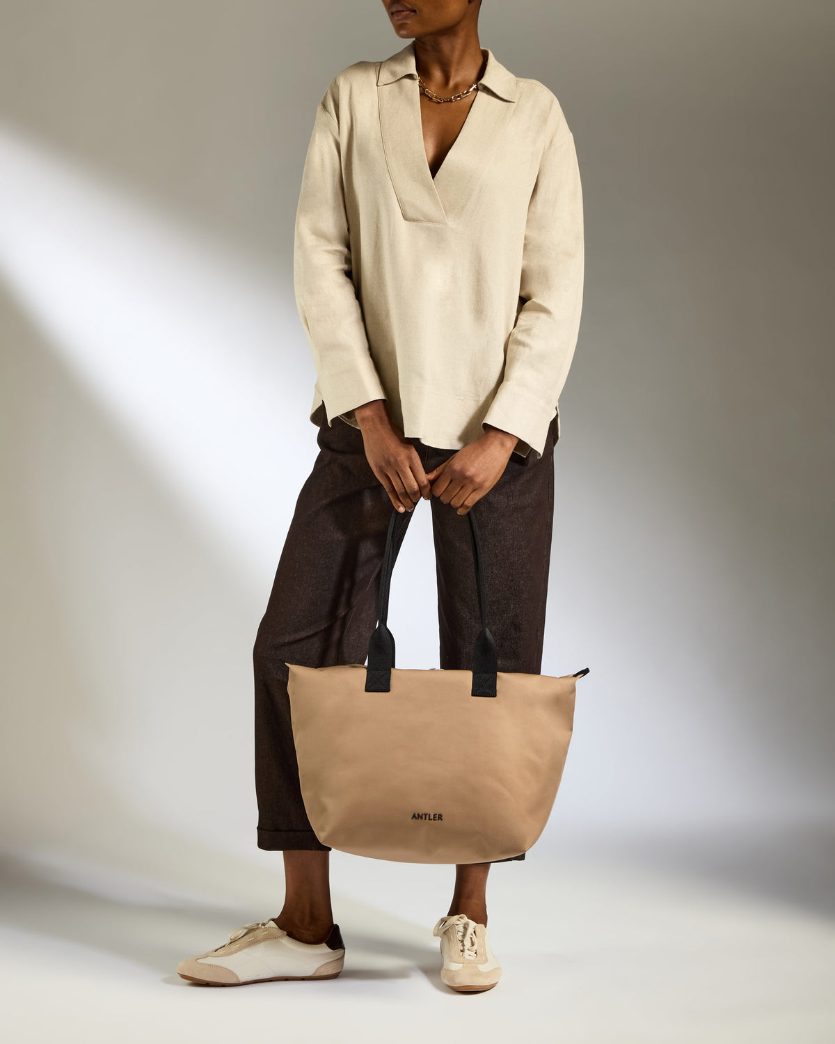a woman holding a bag