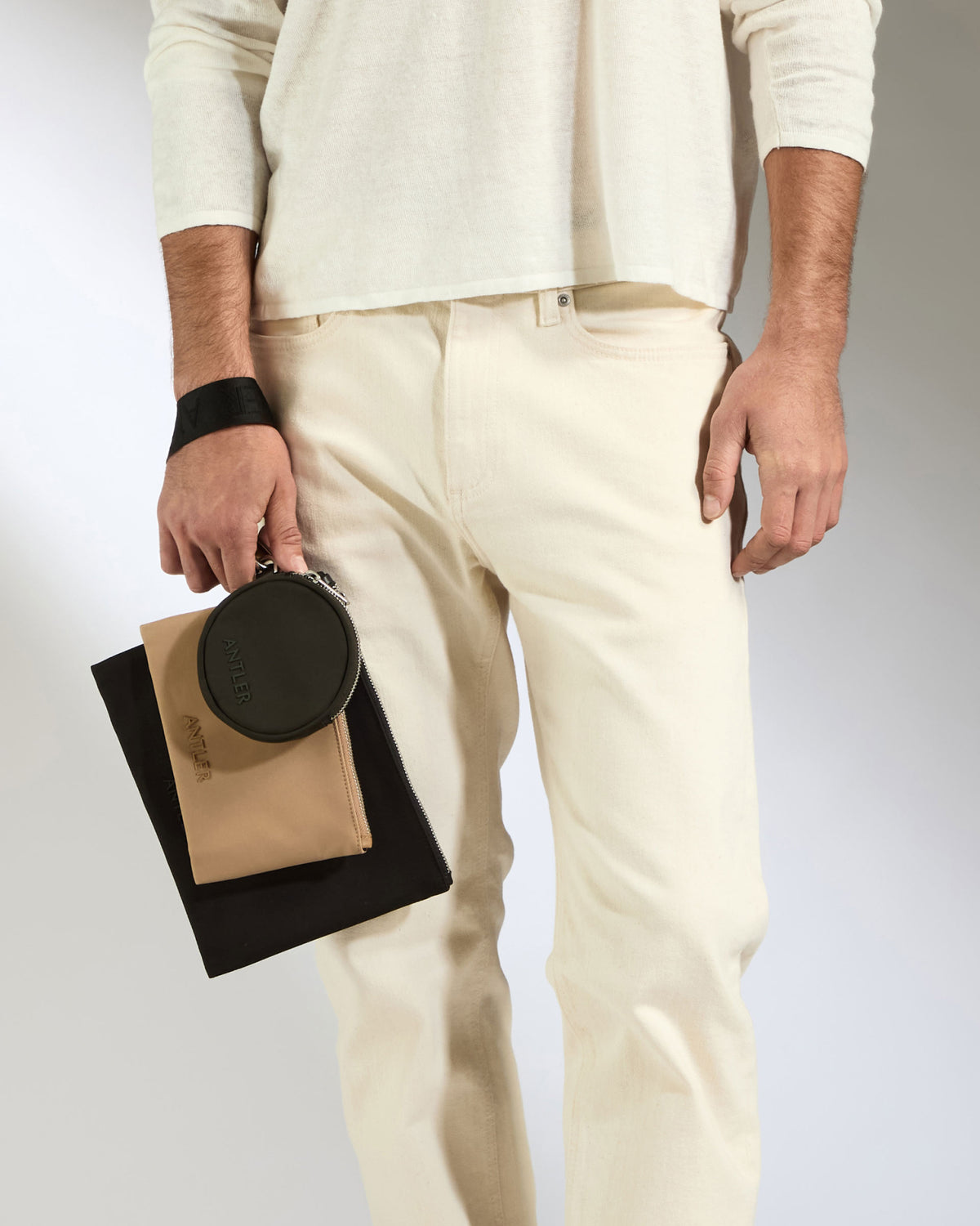 a man holding a bag of books