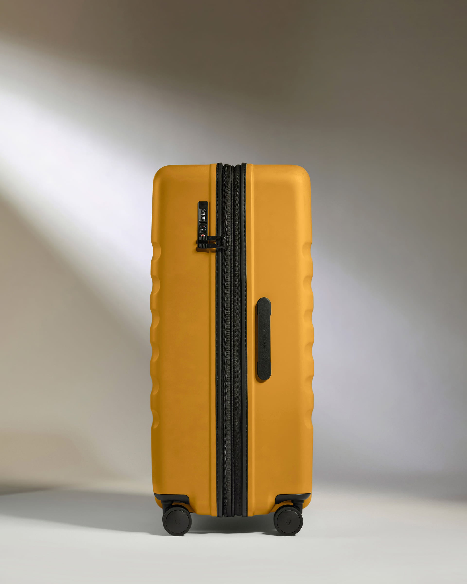 a yellow suitcase with wheels
