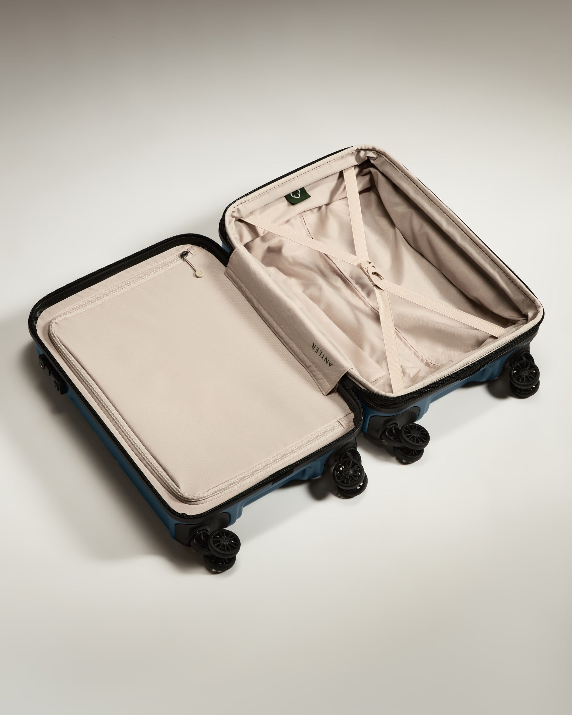 a suitcase with wheels and a lid