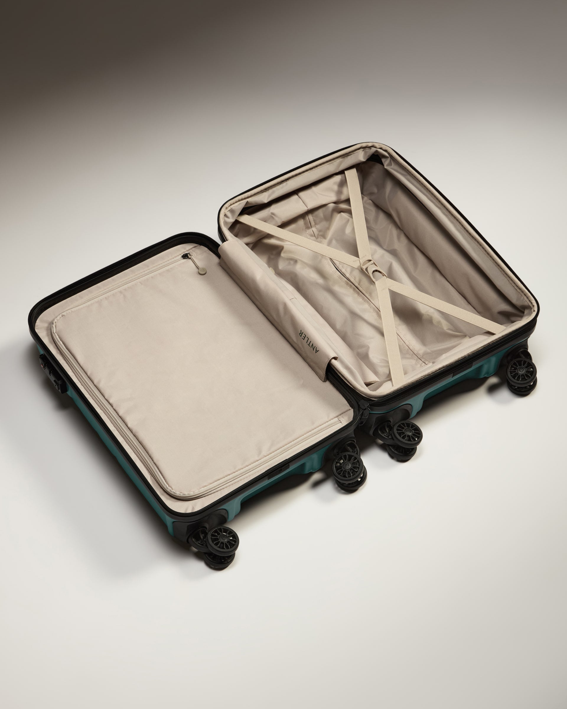 a suitcase with wheels and a lid