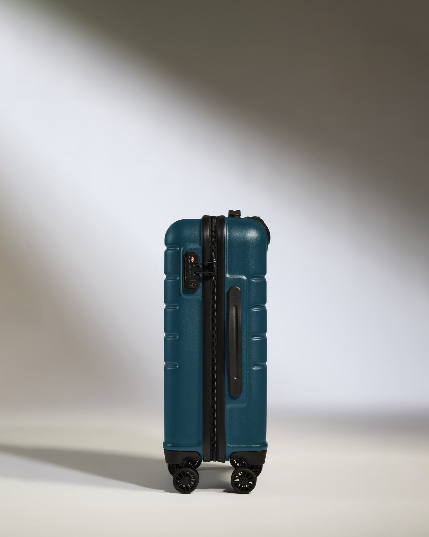 a blue suitcase with wheels