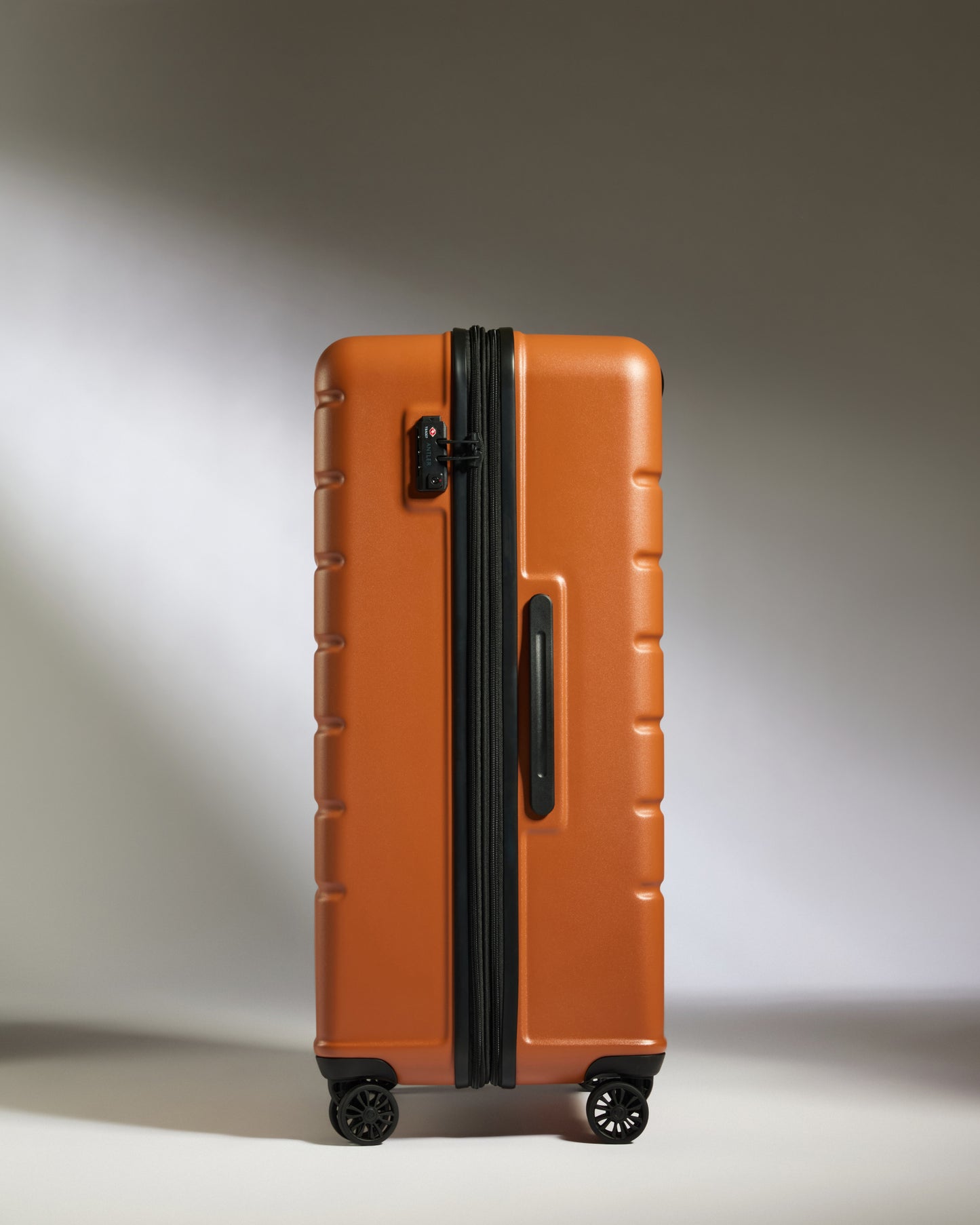 Large Suitcase in Amber - Logo