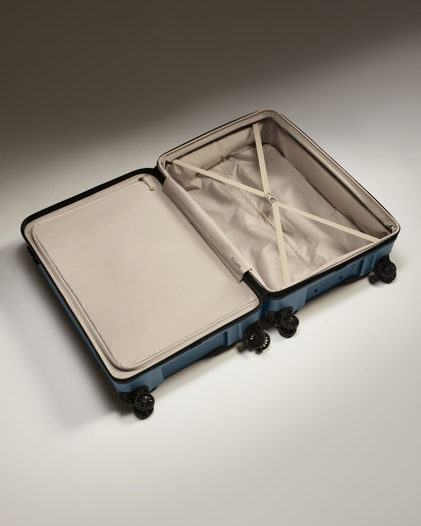 Large Luggage in Blue Grey - Logo