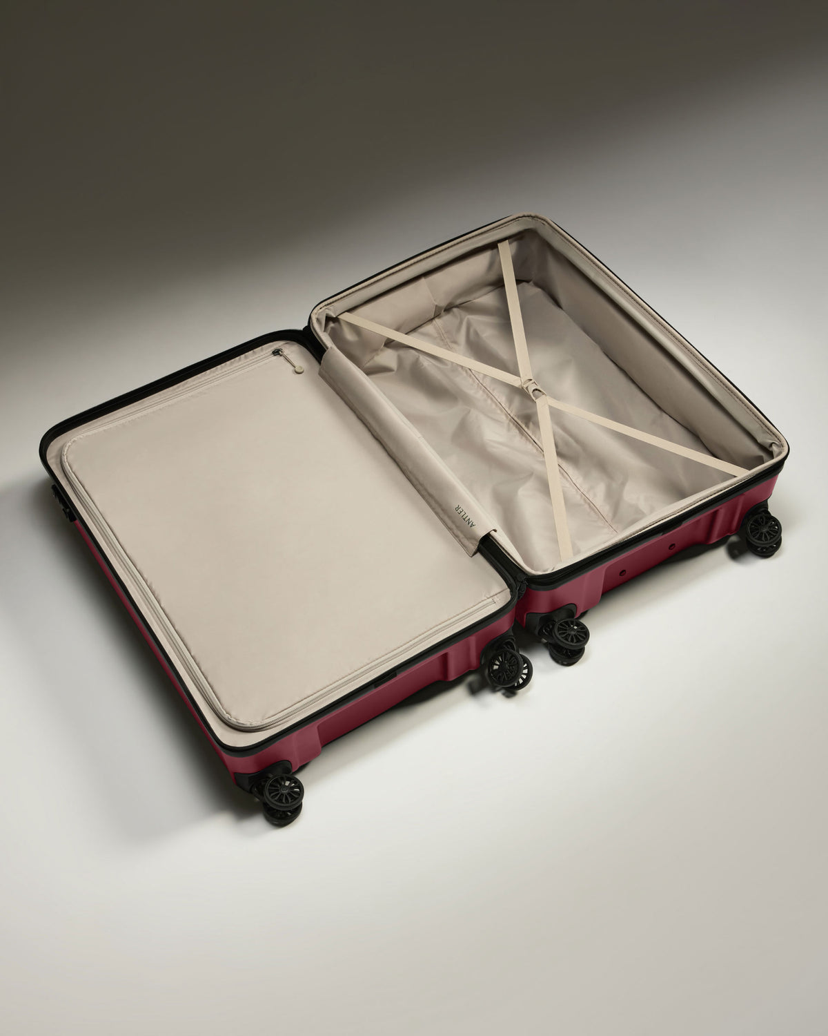 a suitcase with wheels and a lid
