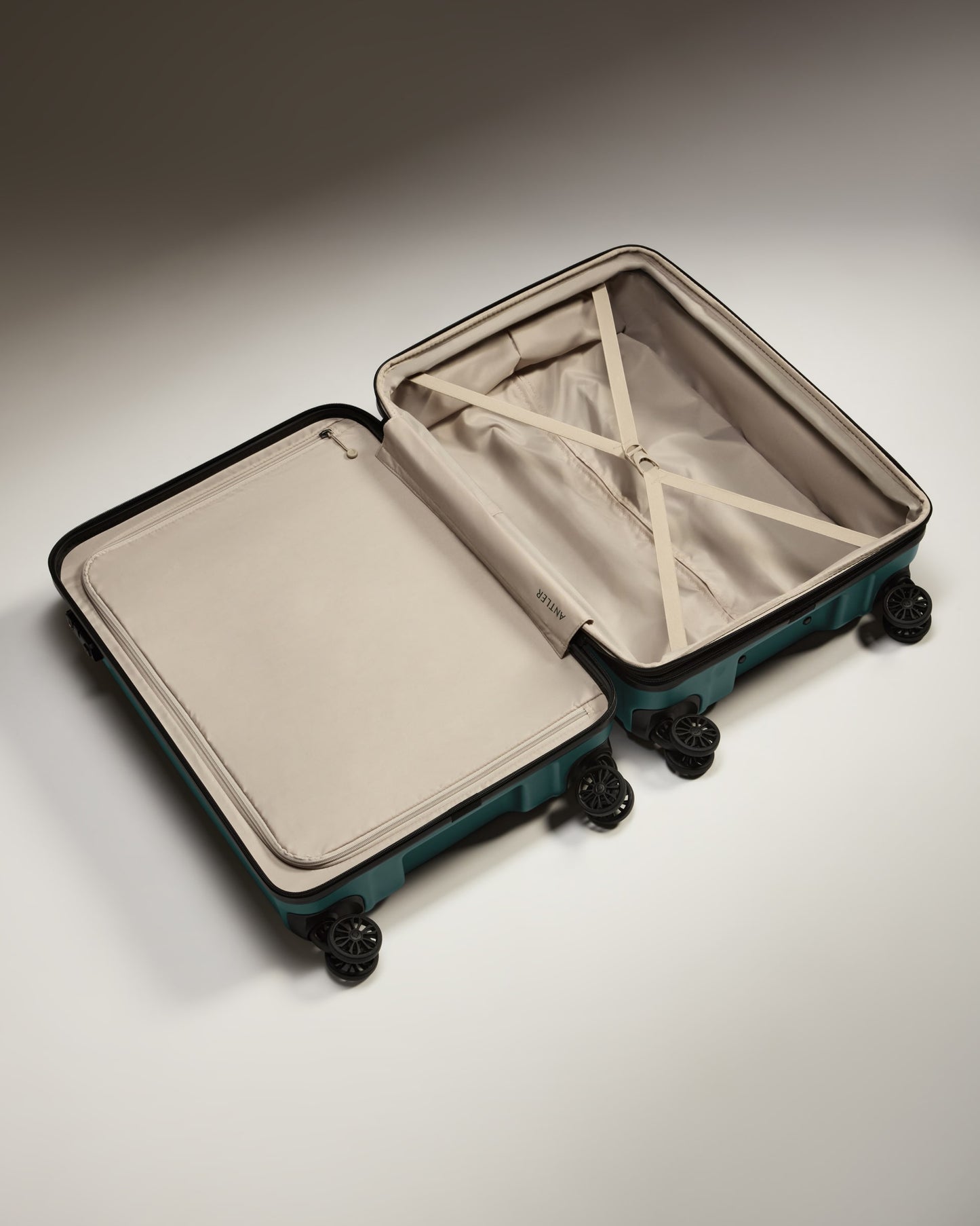 Medium Luggage in Dark Teal - Logo