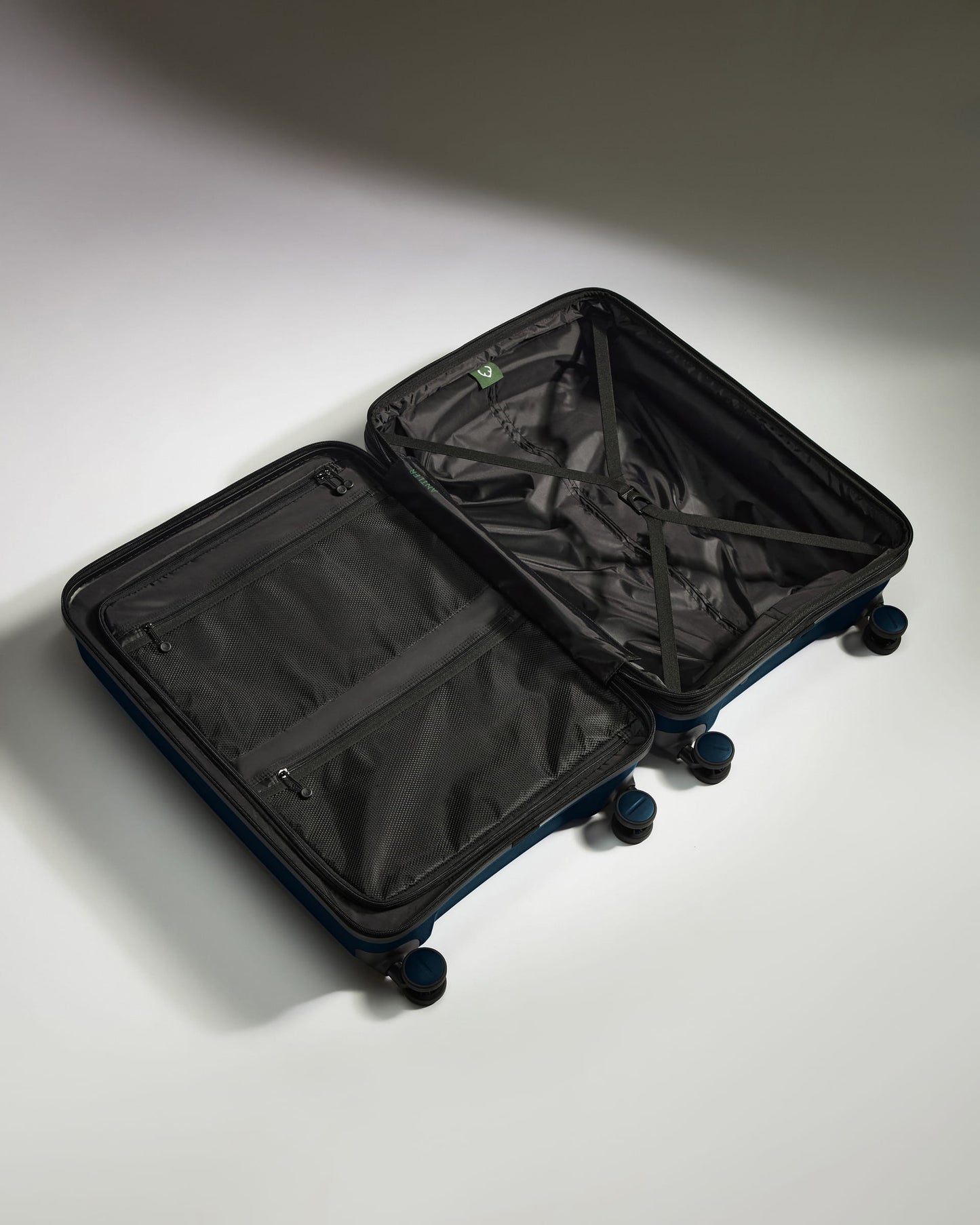 Medium Luggage in Midnight Blue - Logo Stripe