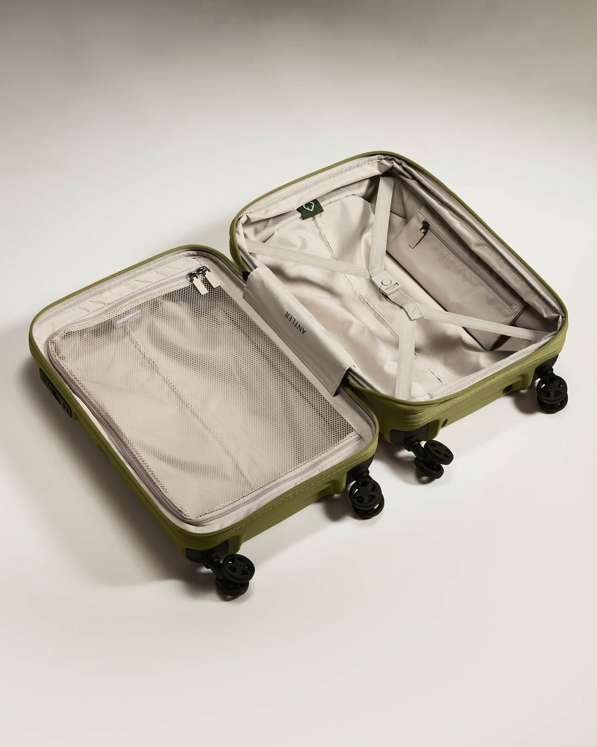 a suitcase with wheels and a lid
