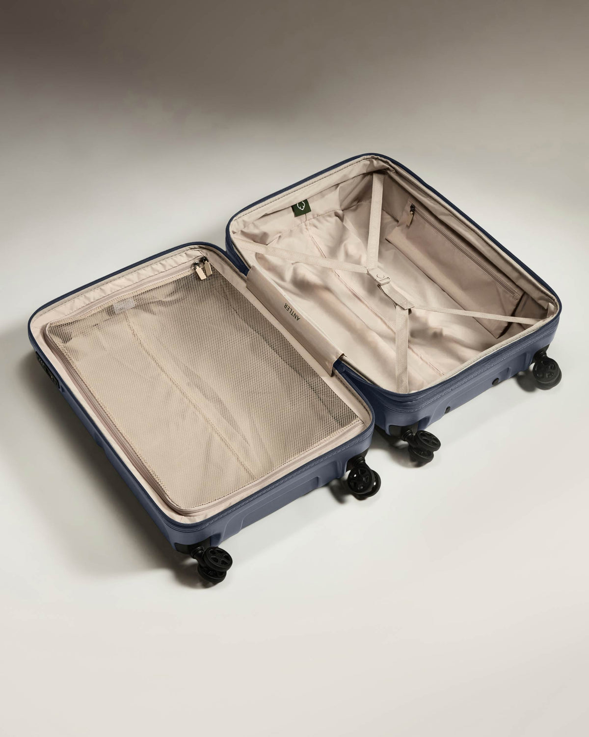 a suitcase with wheels and a lid