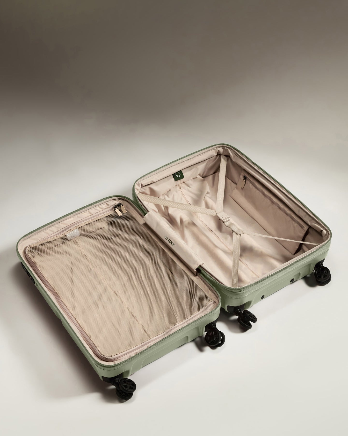 a suitcase with wheels and a lid