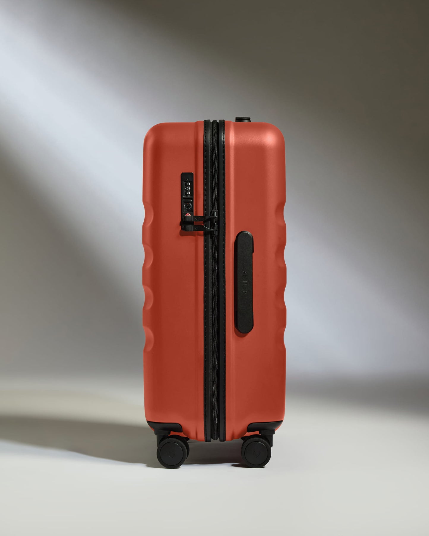 Large Carry-on Luggage in Buckthorn Red - Icon Stripe