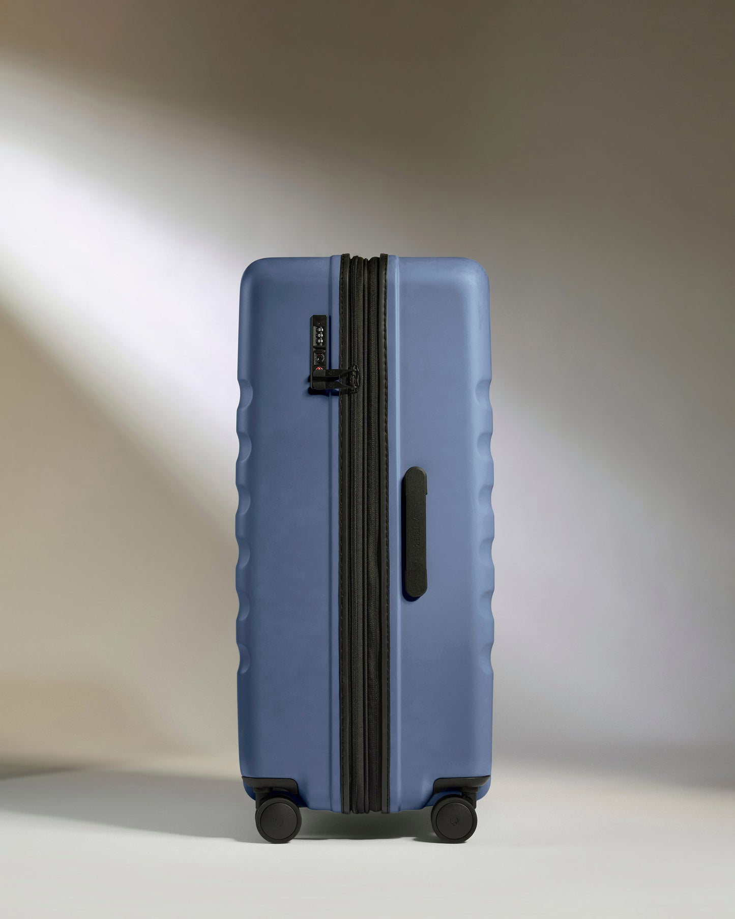 Large Luggage in Ocean Blue - Icon Stripe