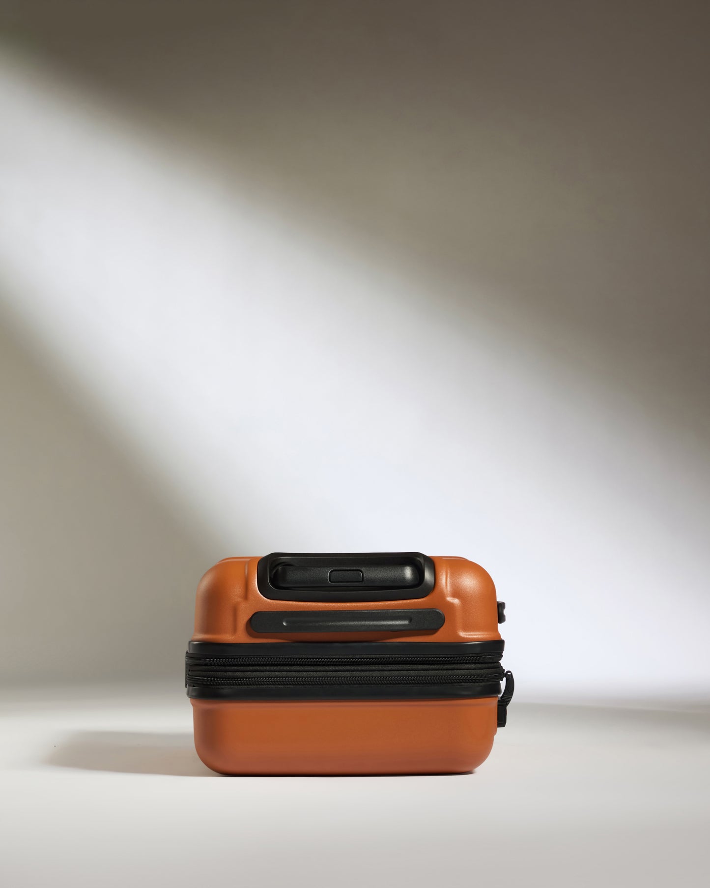Expandable Carry-on Luggage in Amber - Logo