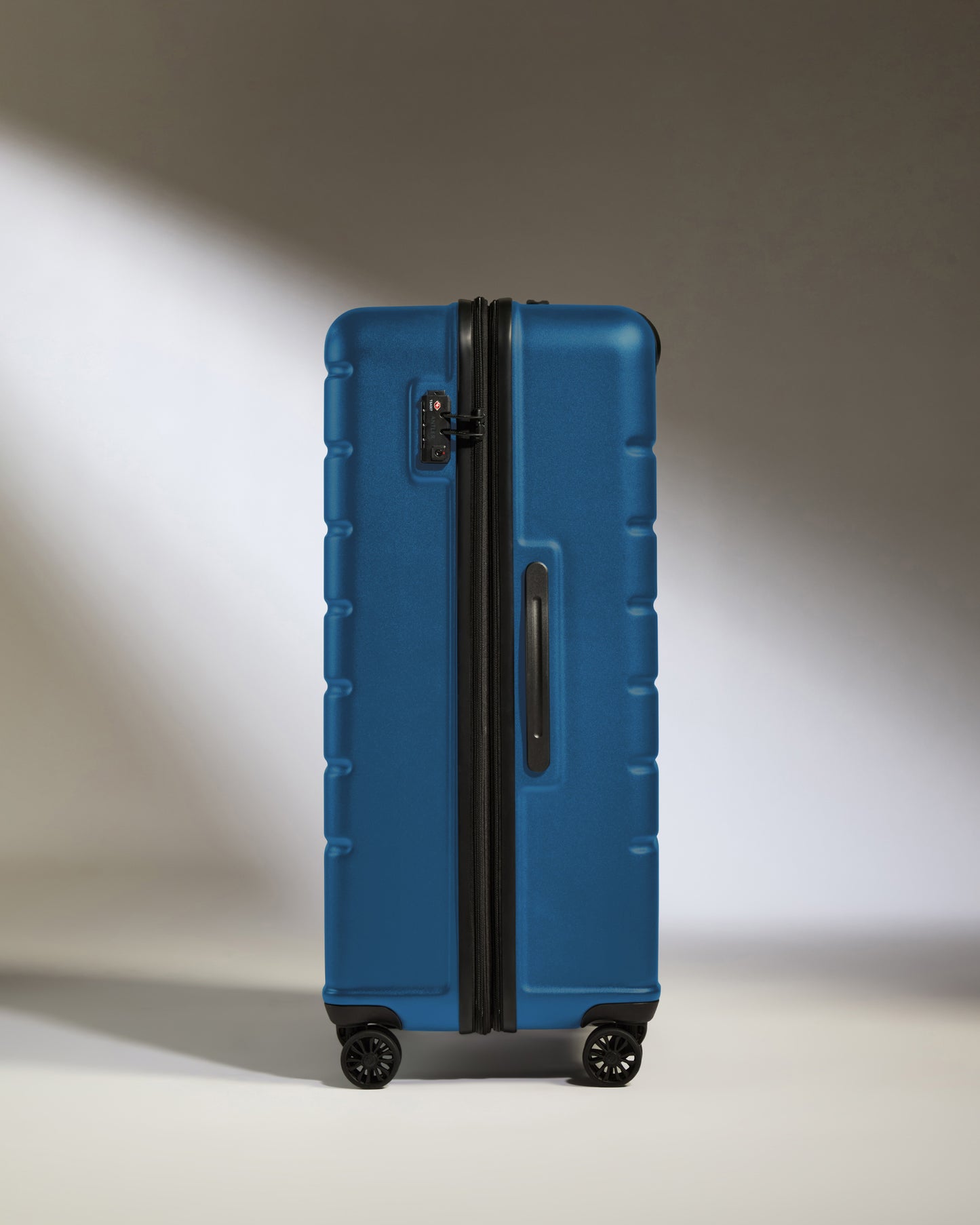 Large Luggage in Bold Blue - Logo