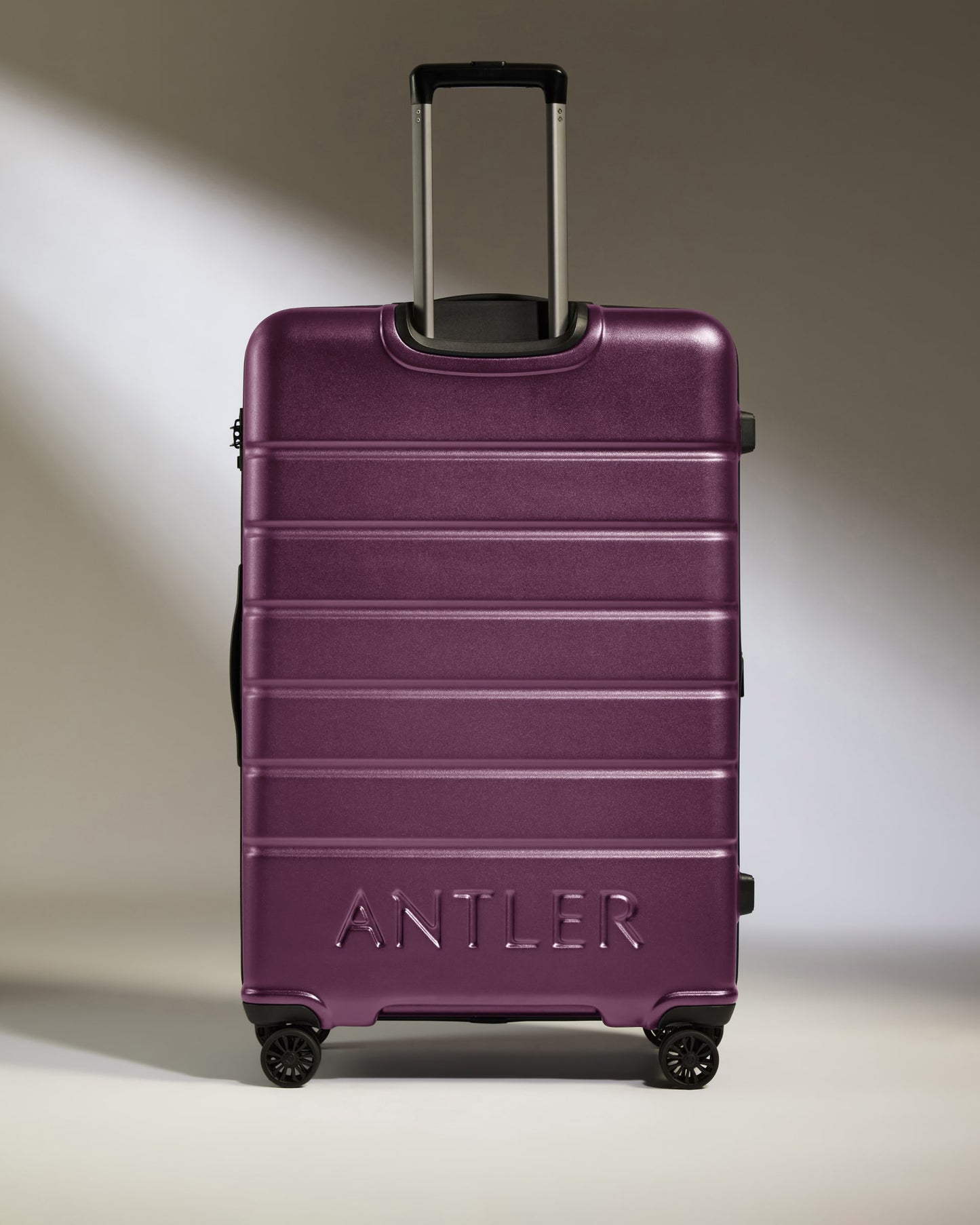 Large Luggage in Dark Heather Purple - Logo