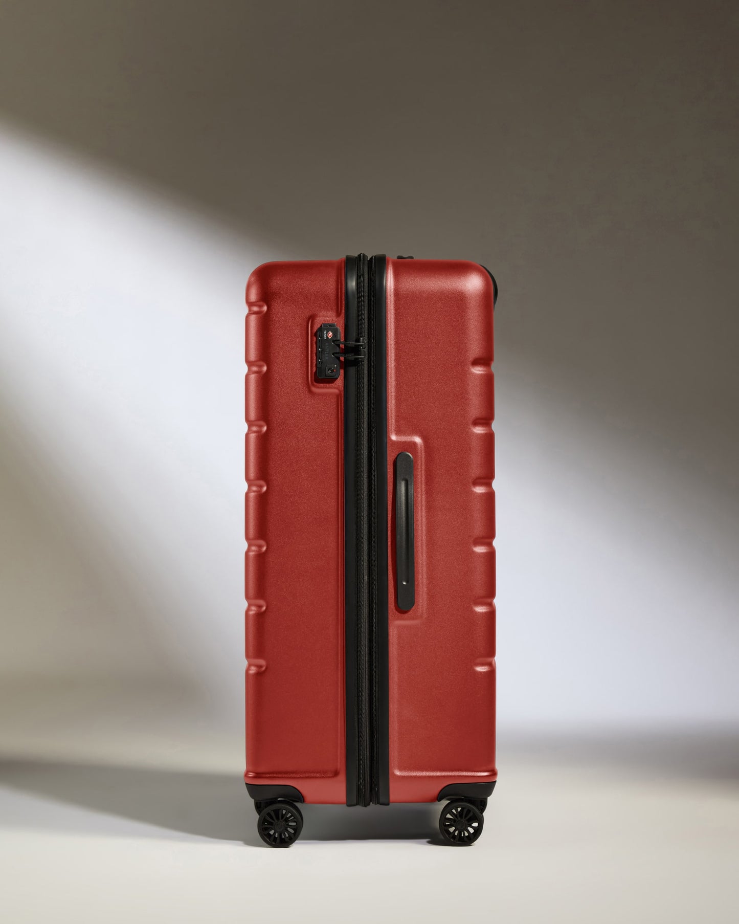 Large Luggage in Red Orange - Logo