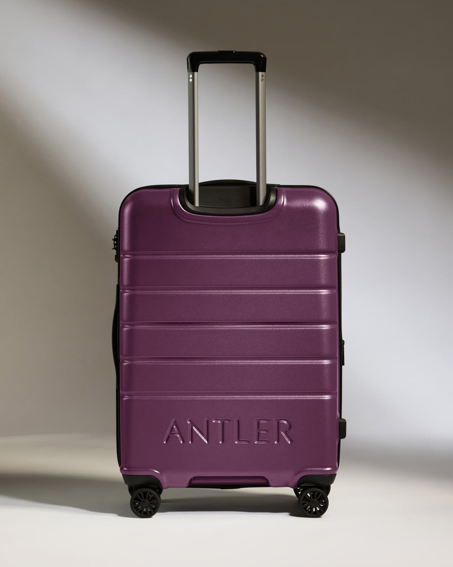 Medium Luggage in Dark Heather Purple - Logo