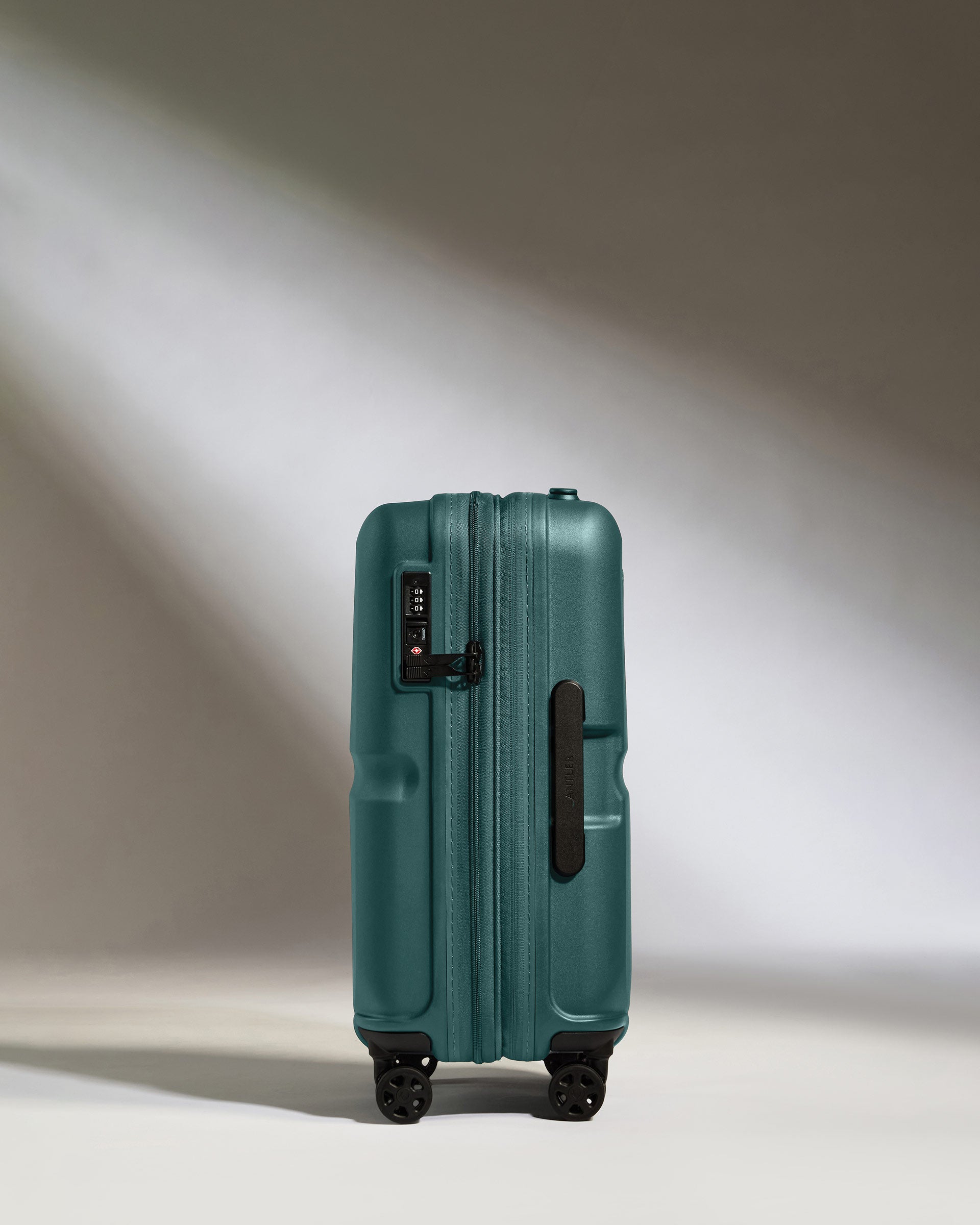 a blue suitcase with wheels