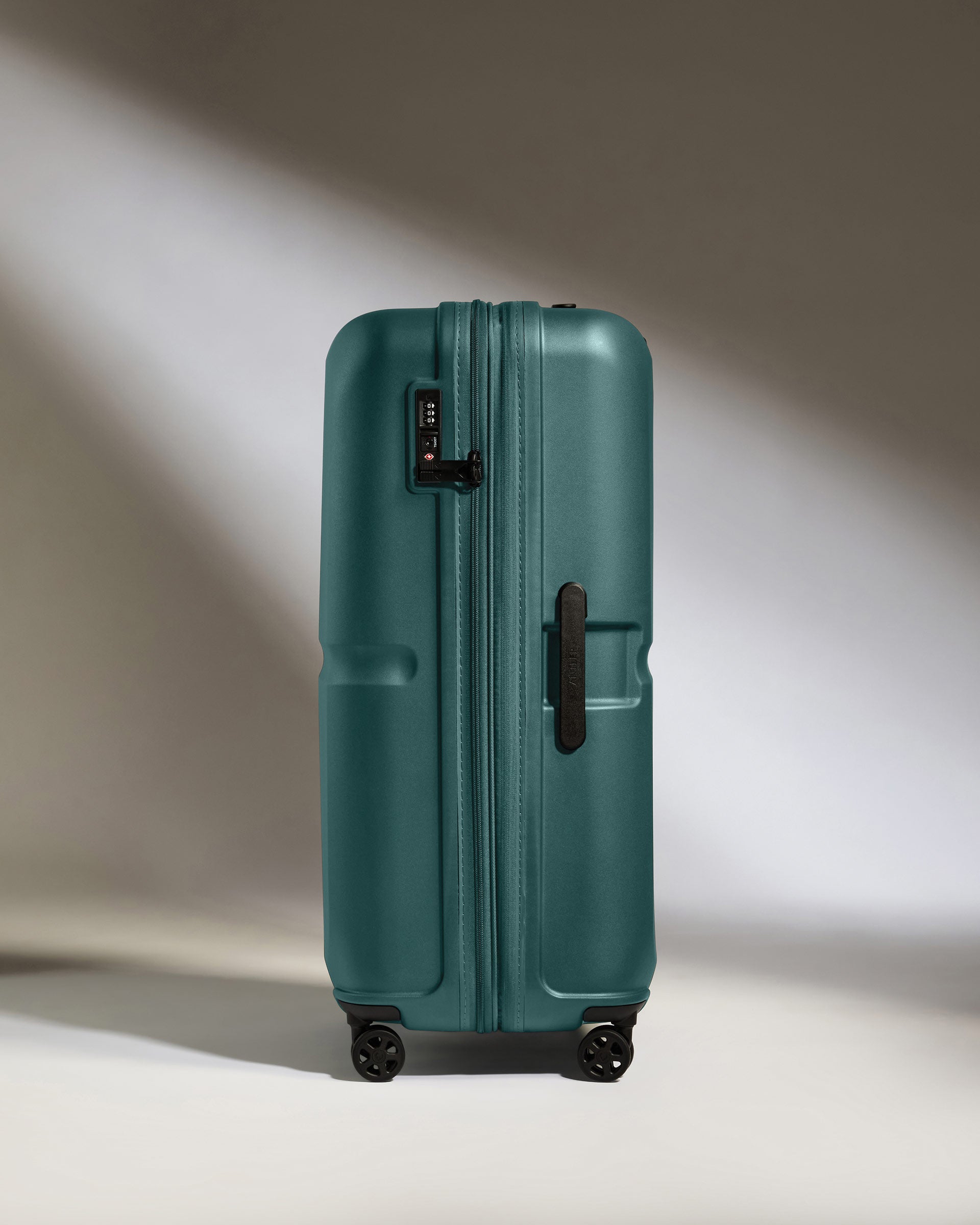 a blue suitcase with wheels