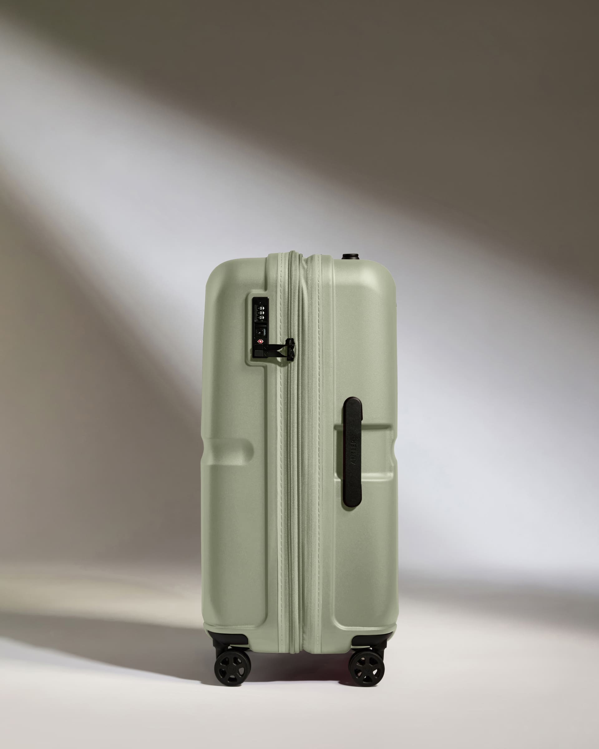 a suitcase with wheels and handle