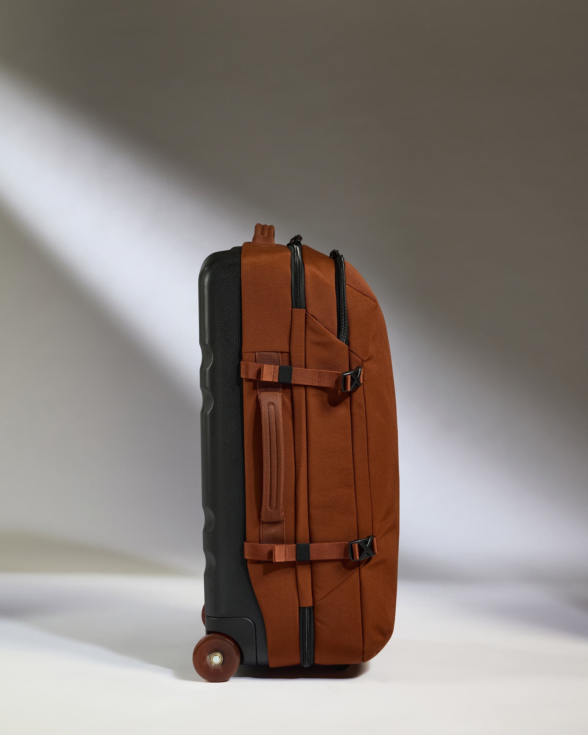 a brown and black suitcase