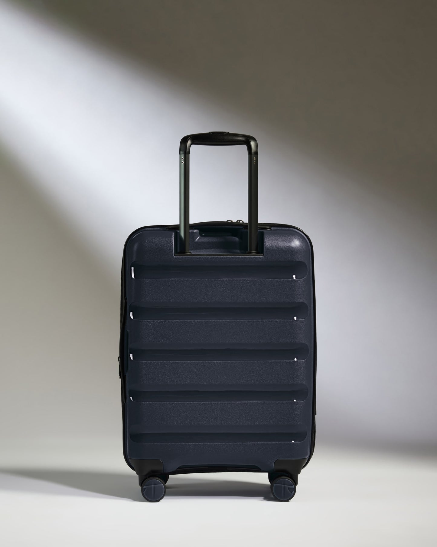 Expandable Carry-on Luggage in Navy - Logo Stripe