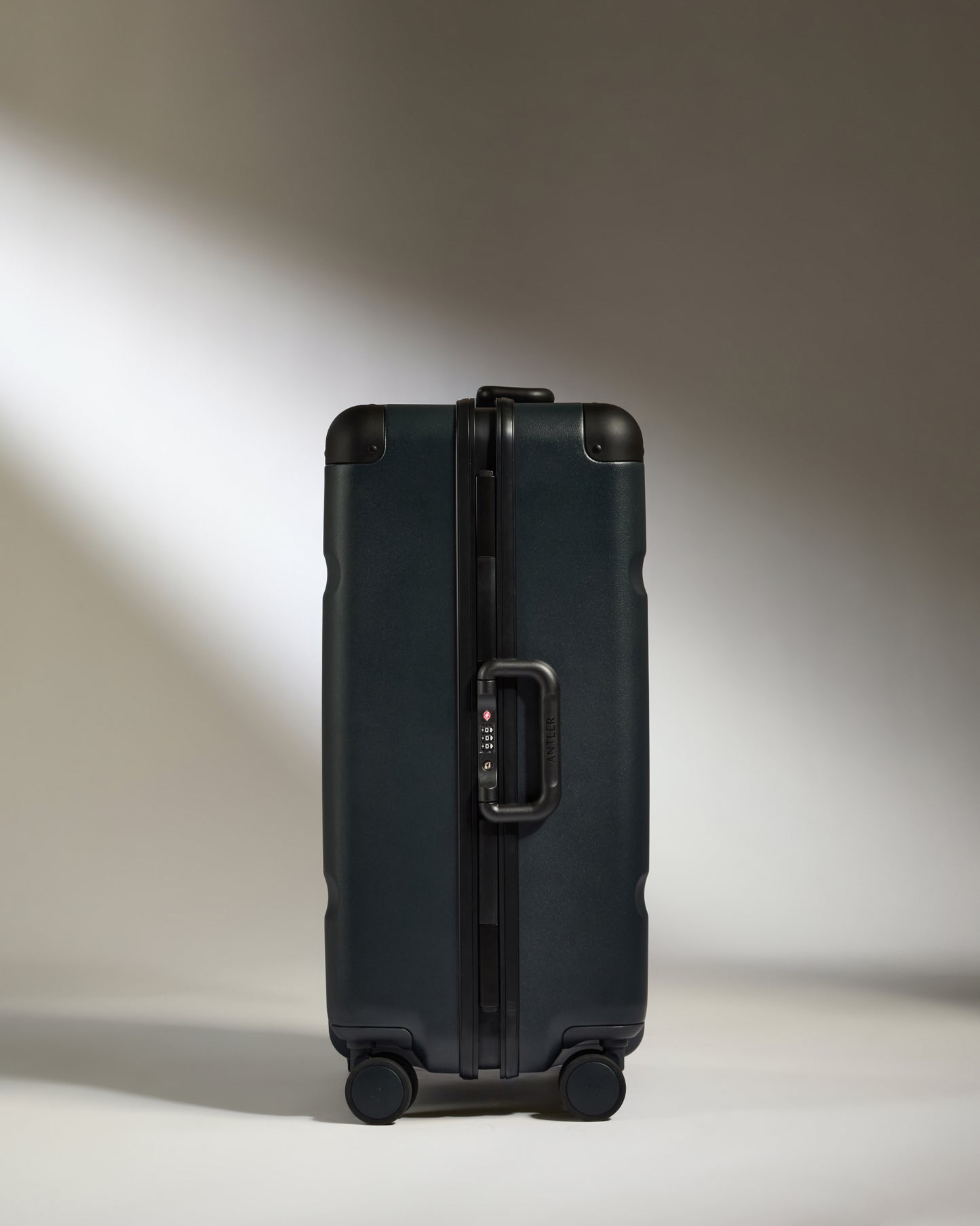 Medium Luggage in Basalt Navy - Heritage Stripe