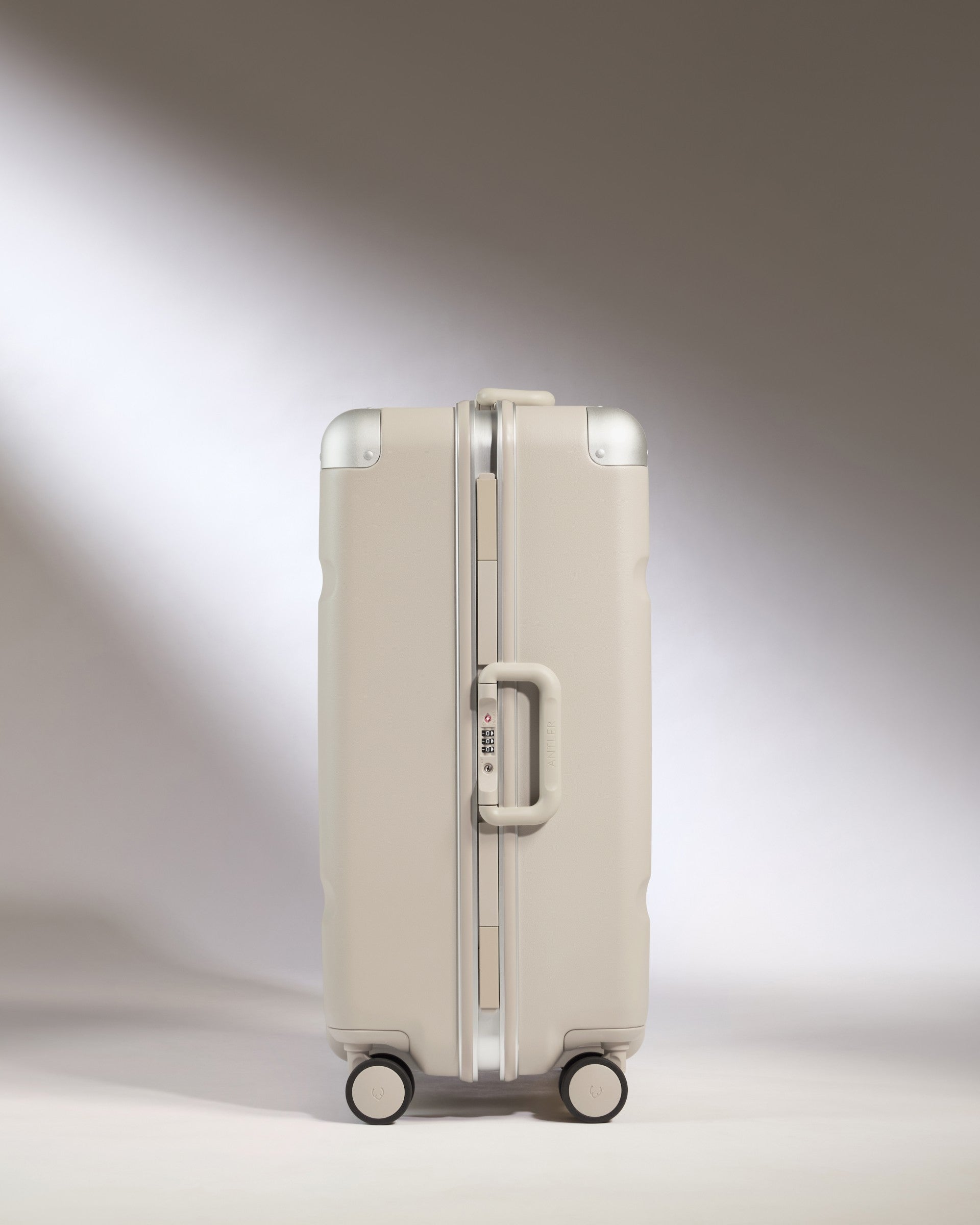 a white suitcase with wheels