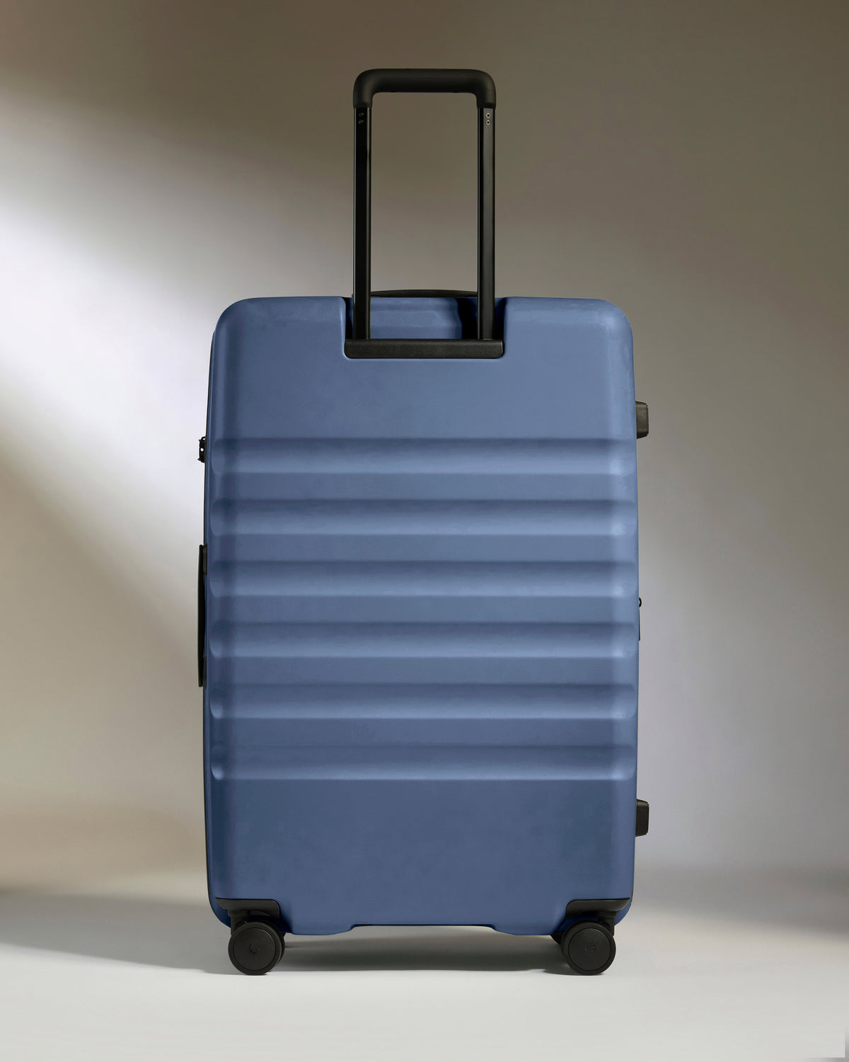 Large Luggage in Ocean Blue - Icon Stripe