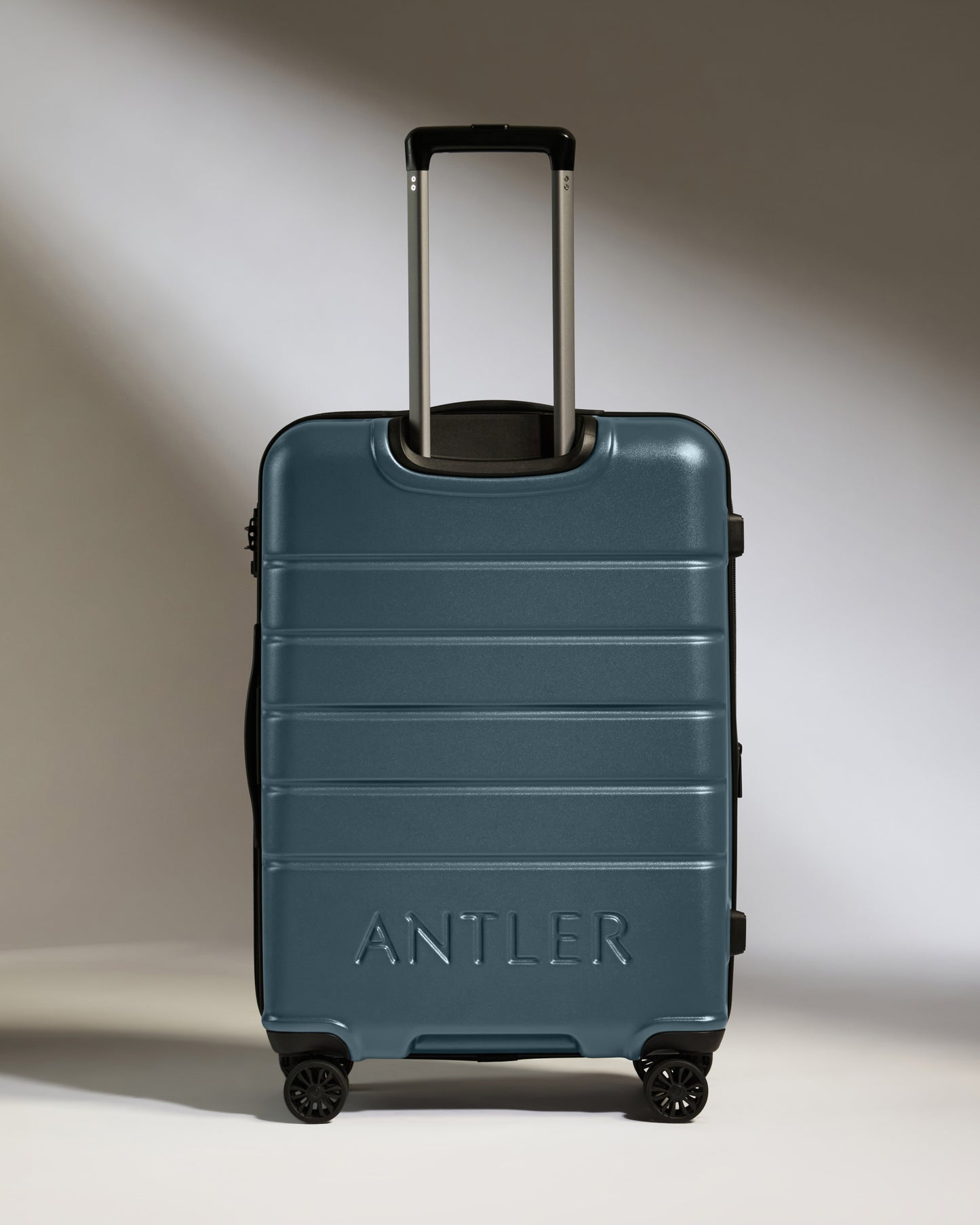 Medium Luggage in Blue Grey - Logo