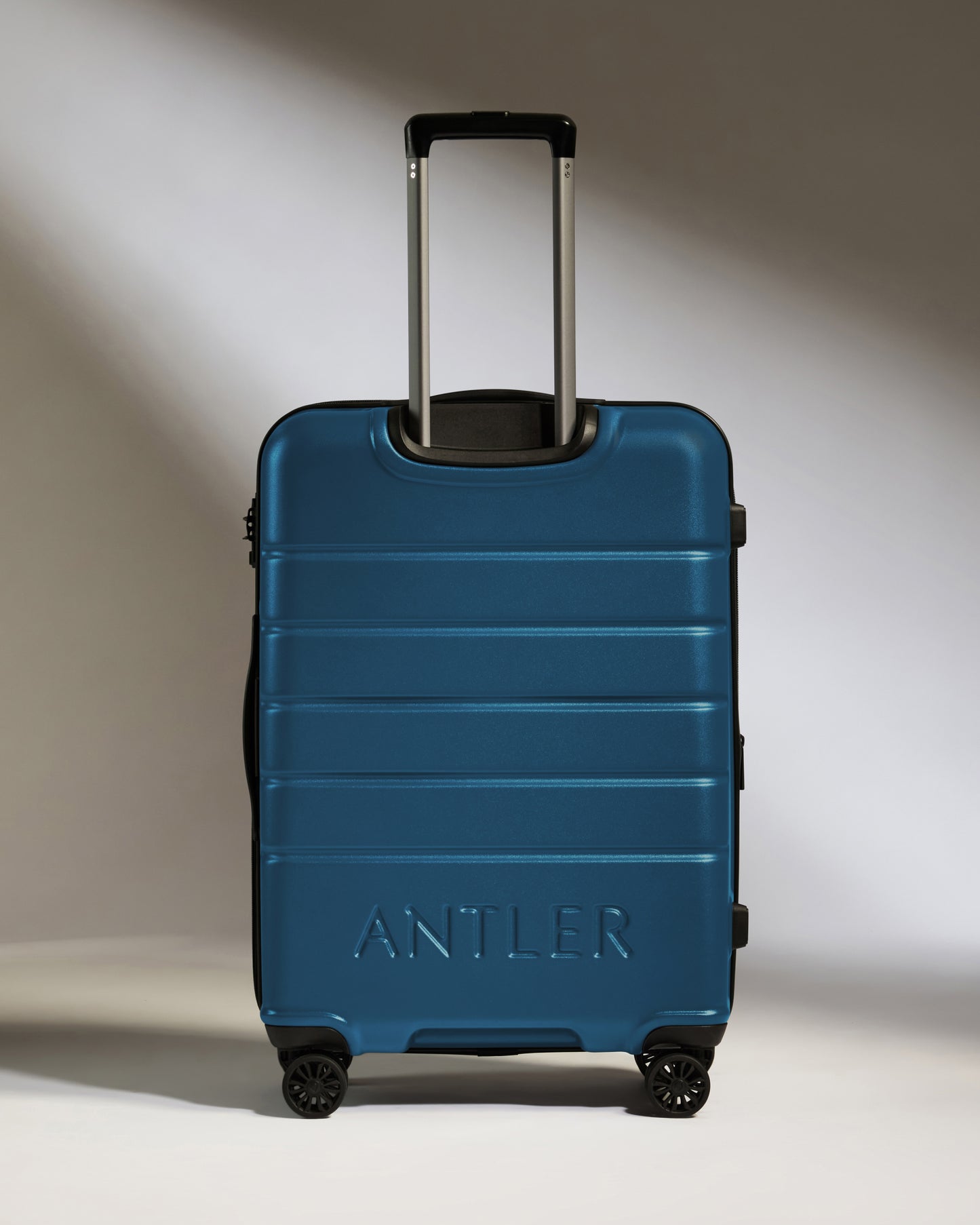Medium Luggage in Bold Blue - Logo