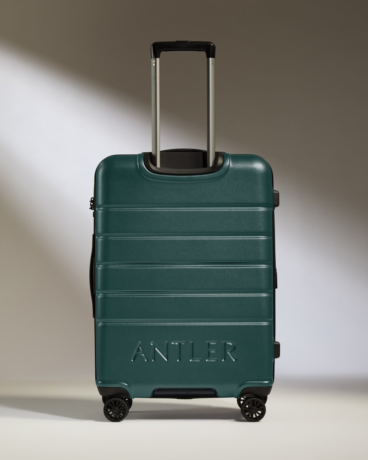 Medium Luggage in Dark Teal - Logo