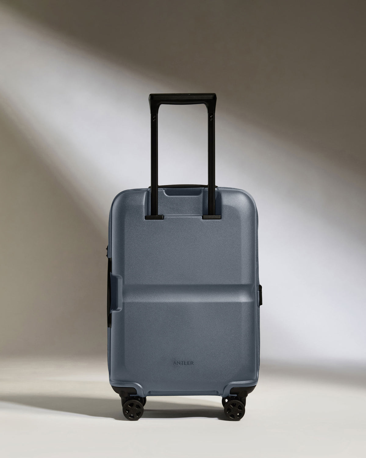 a blue suitcase with wheels