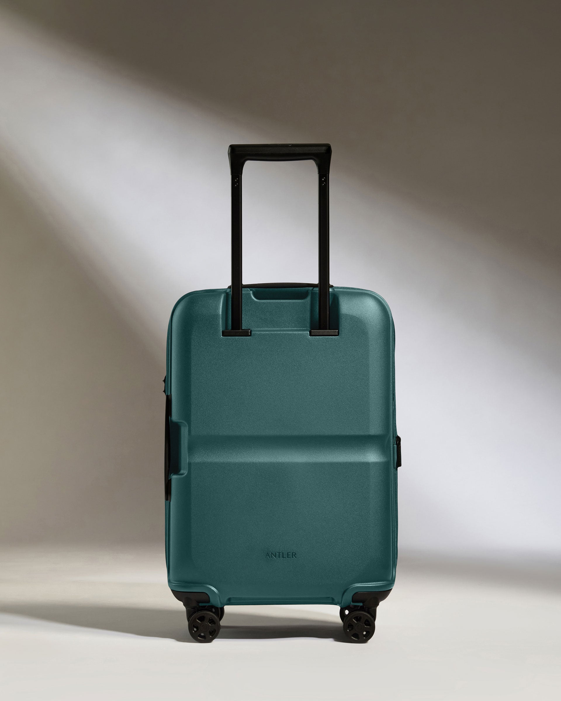 a blue suitcase with wheels