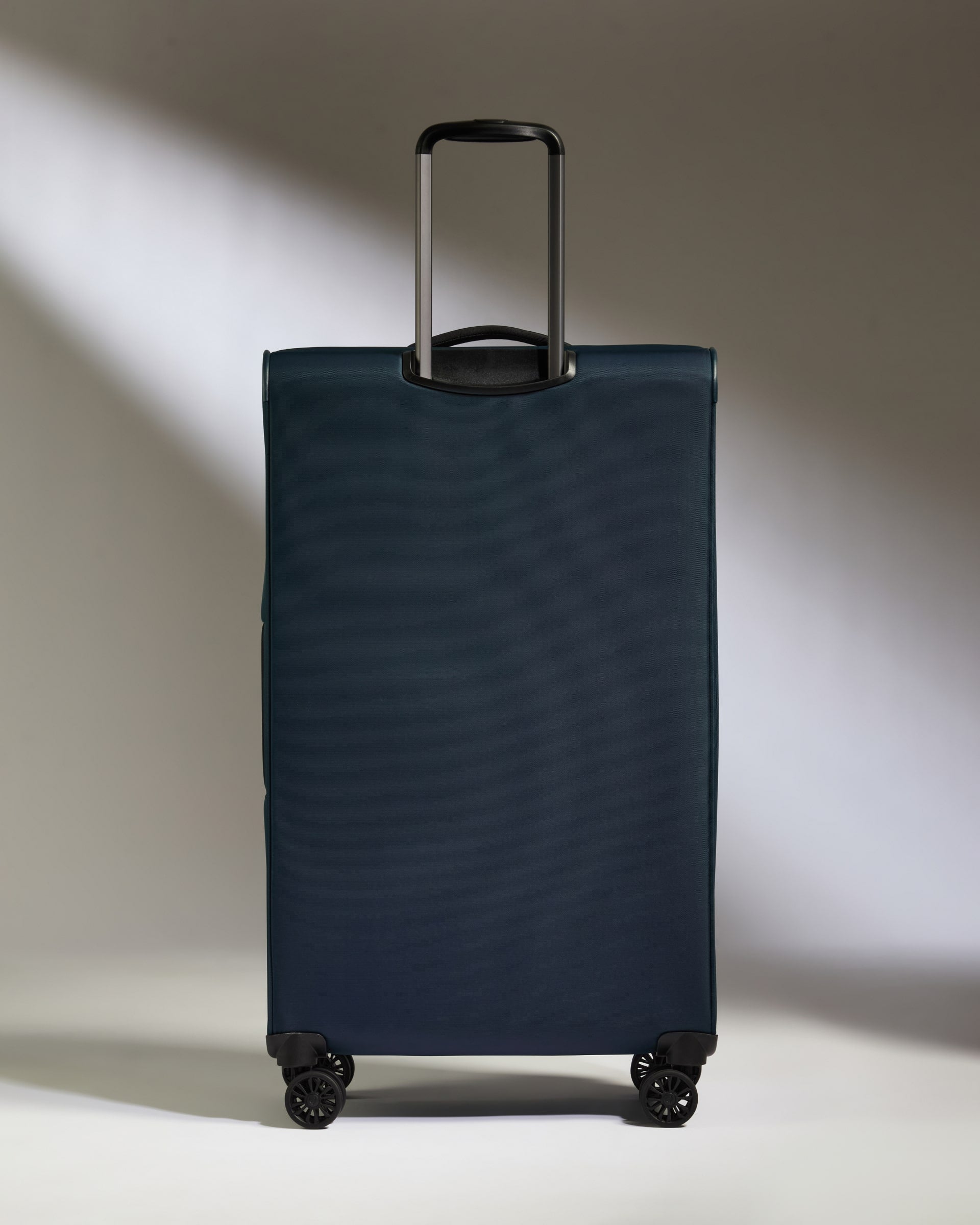 a blue suitcase with wheels