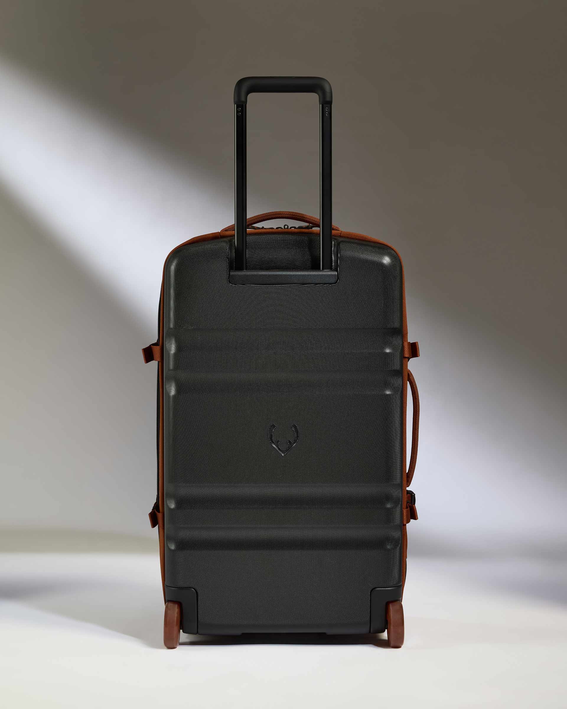 a suitcase with wheels and handle